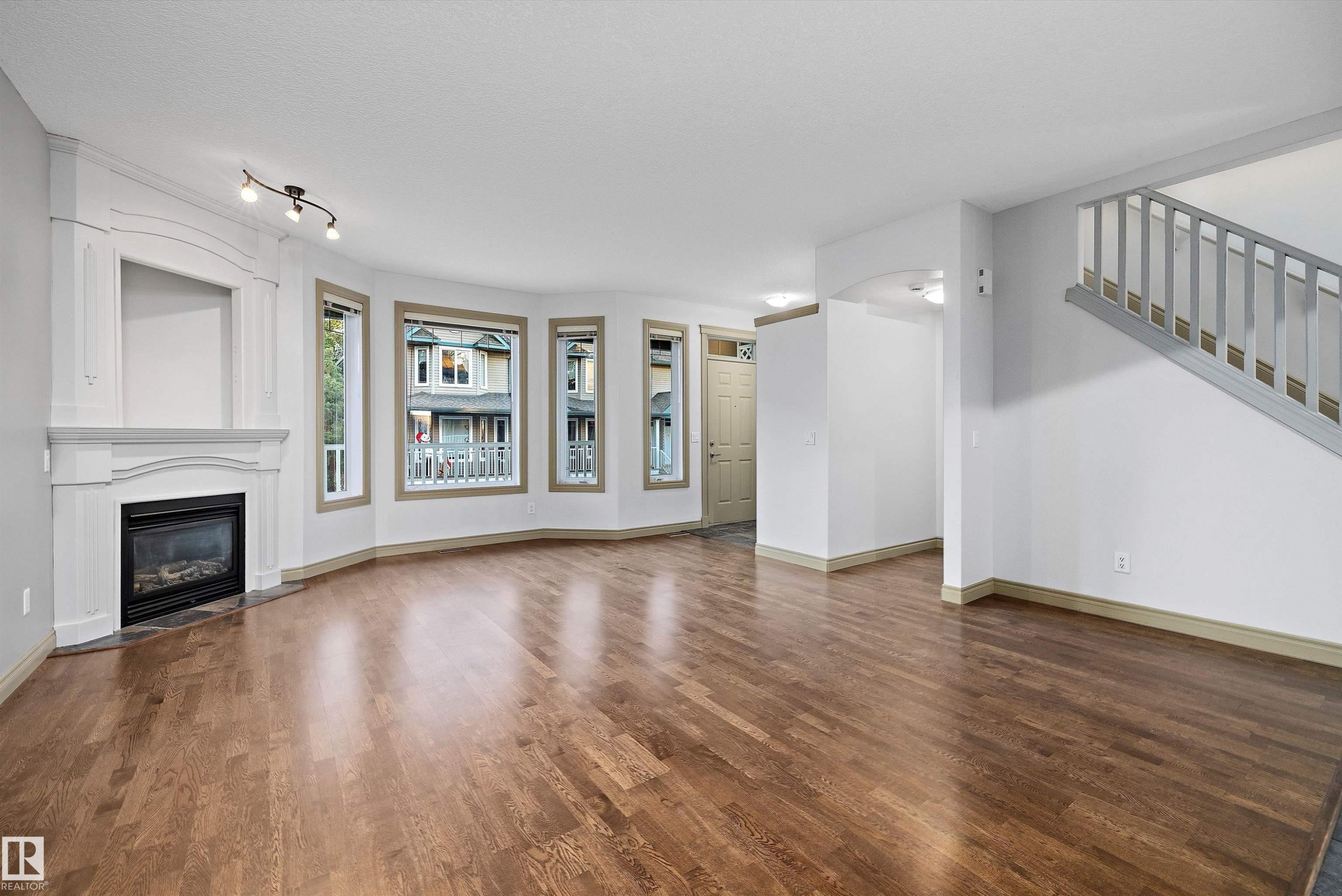 17 903 Rutherford Road, Edmonton, AB - Indoor Photo Showing Living Room With Fireplace