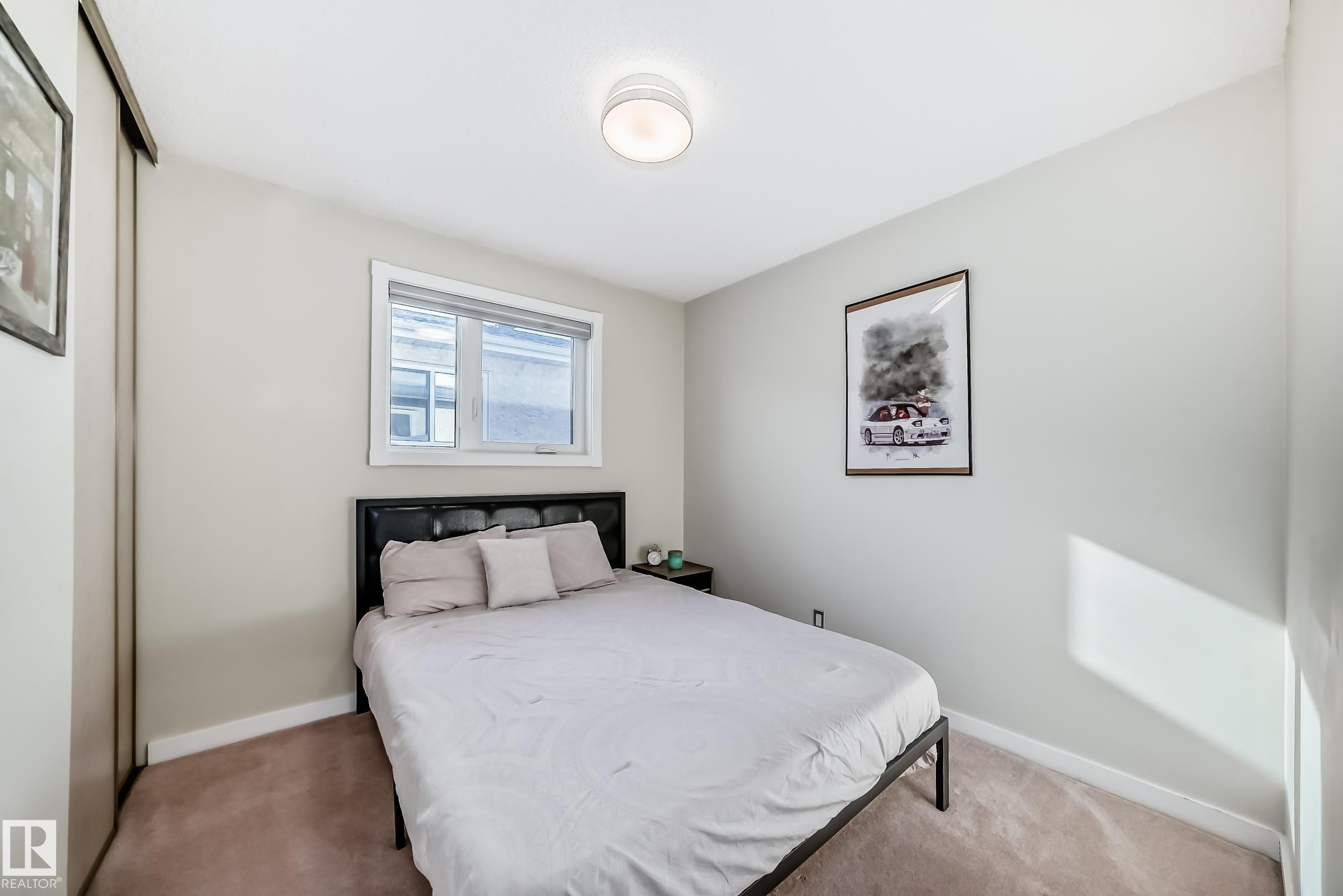 Carpeted bedroom with a closet - 7011 190B Street, Edmonton, AB - Indoor Photo Showing Bedroom
