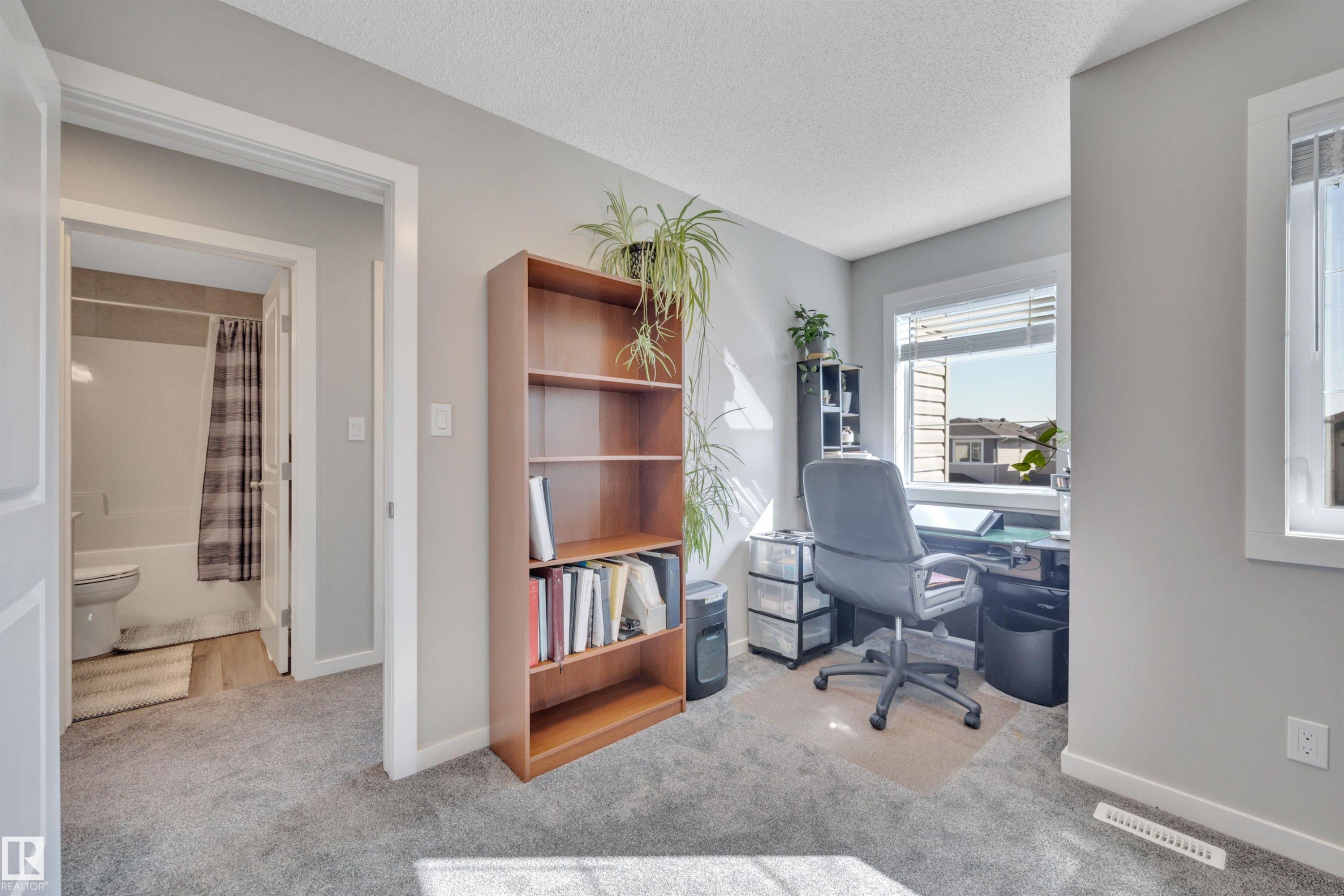 Office featuring light colored carpet and a textured ceiling - 157 Larch Crescent, Leduc, AB - Indoor Photo Showing Office