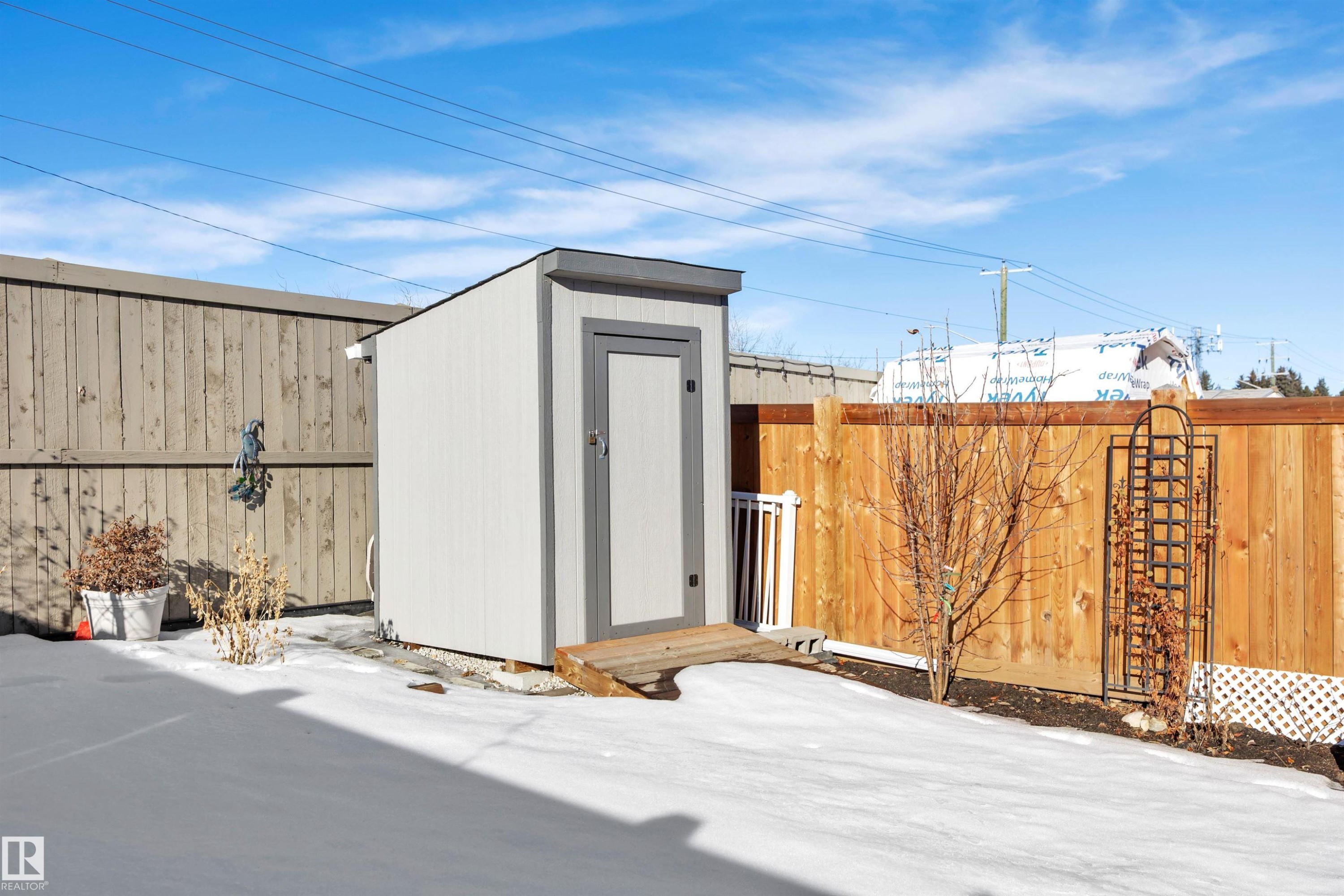 View of shed featuring a fenced backyard - 157 Larch Crescent, Leduc, AB - Outdoor