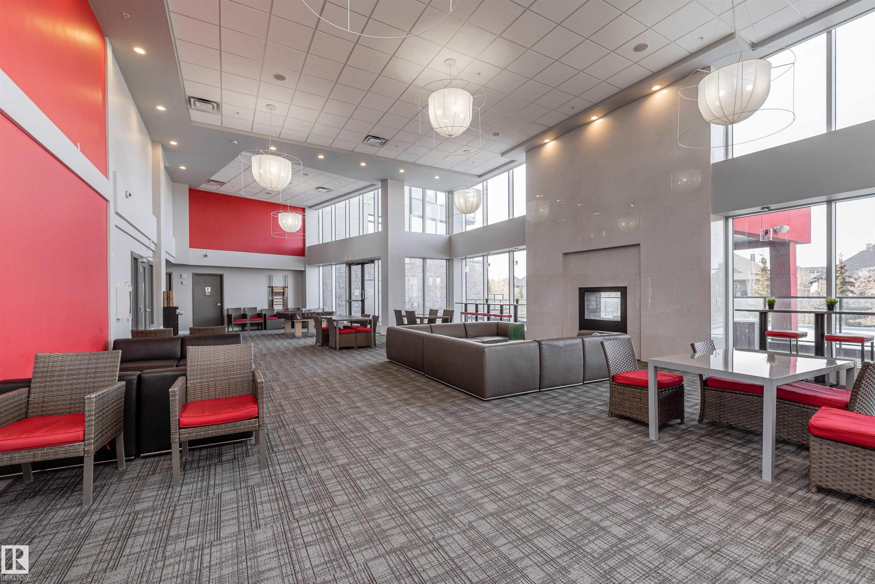 Lobby featuring a high ceiling and recessed lighting - 332 5151 Windermere Boulevard, Edmonton, AB - Indoor Photo Showing Other Room