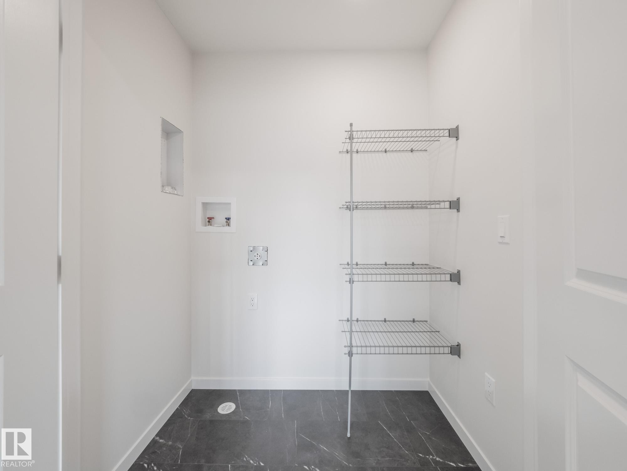 1025 Aster Boulevard, Edmonton, AB - Indoor With Storage