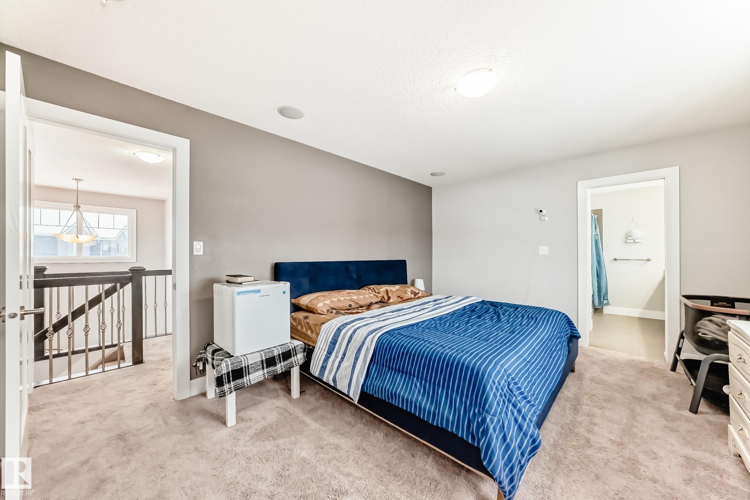 Bedroom featuring light carpet - 41 4835 Wright Drive, Edmonton, AB - Indoor Photo Showing Bedroom