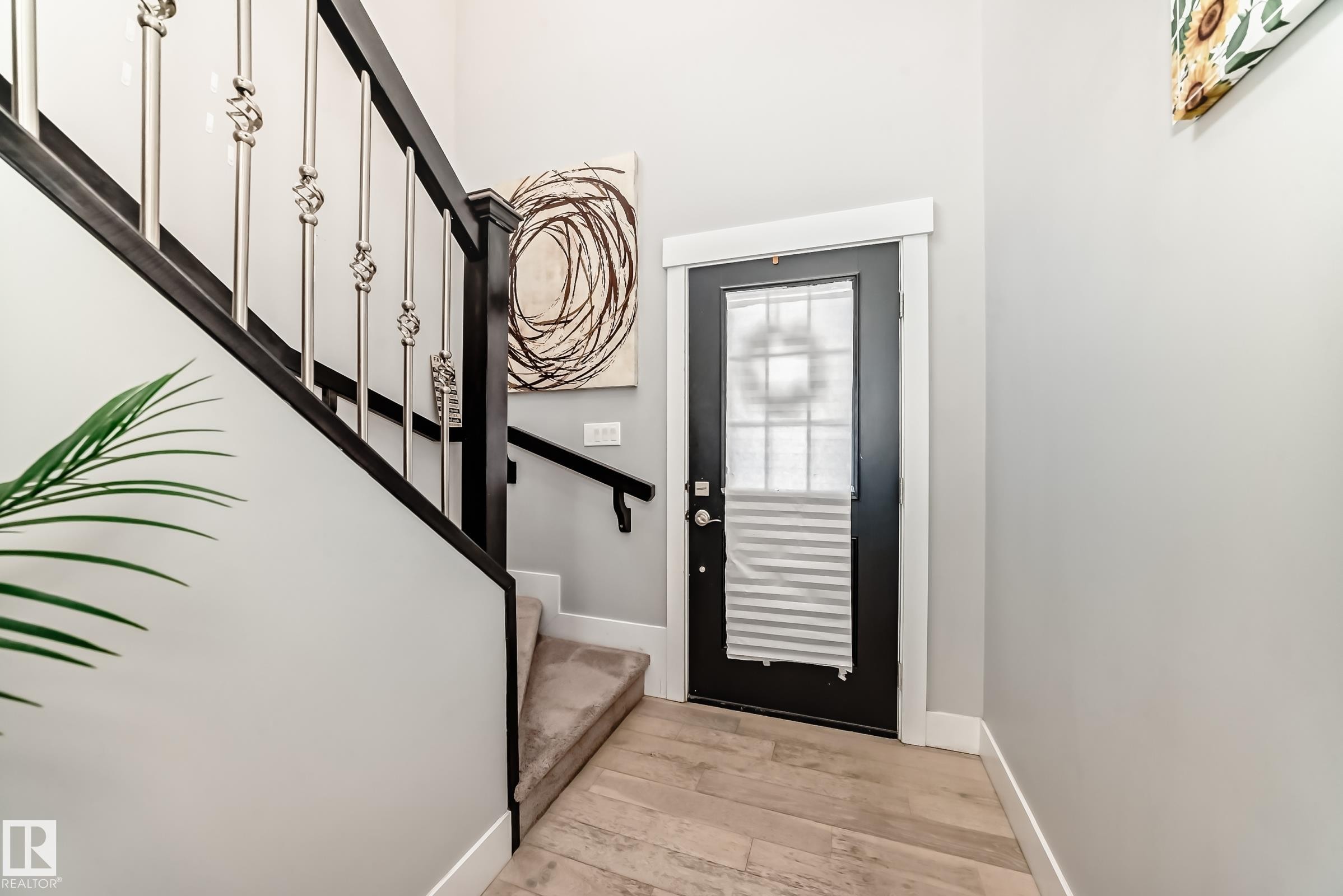 Foyer entrance featuring stairway and light wood-style floors - 41 4835 Wright Drive, Edmonton, AB - Indoor Photo Showing Other Room