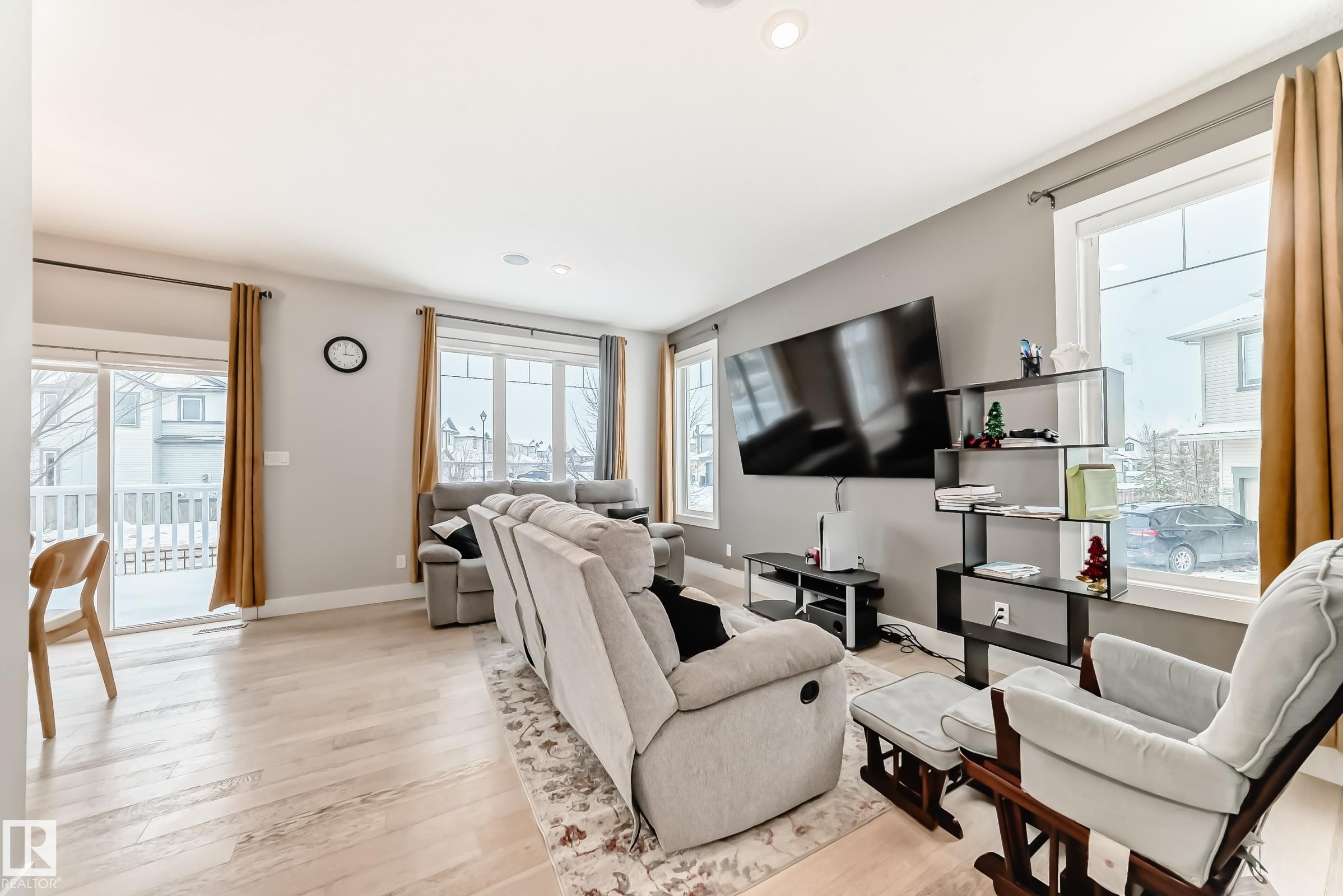 Living area featuring light wood finished floors and recessed lighting - 41 4835 Wright Drive, Edmonton, AB - Indoor Photo Showing Living Room