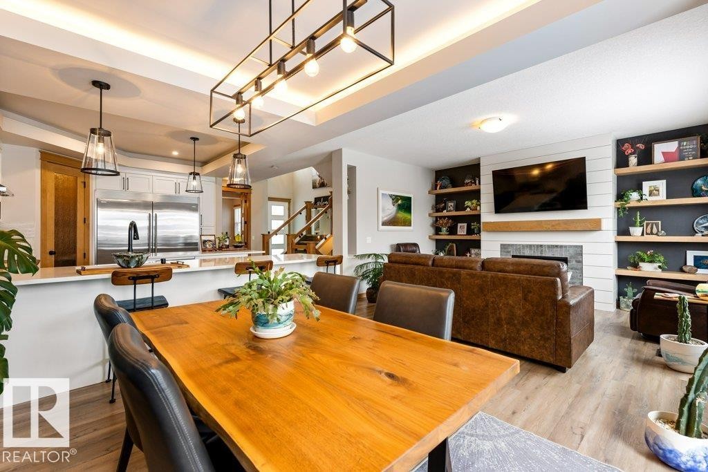 19 Riviere Terrace, St. Albert, AB - Indoor Photo Showing Dining Room With Fireplace