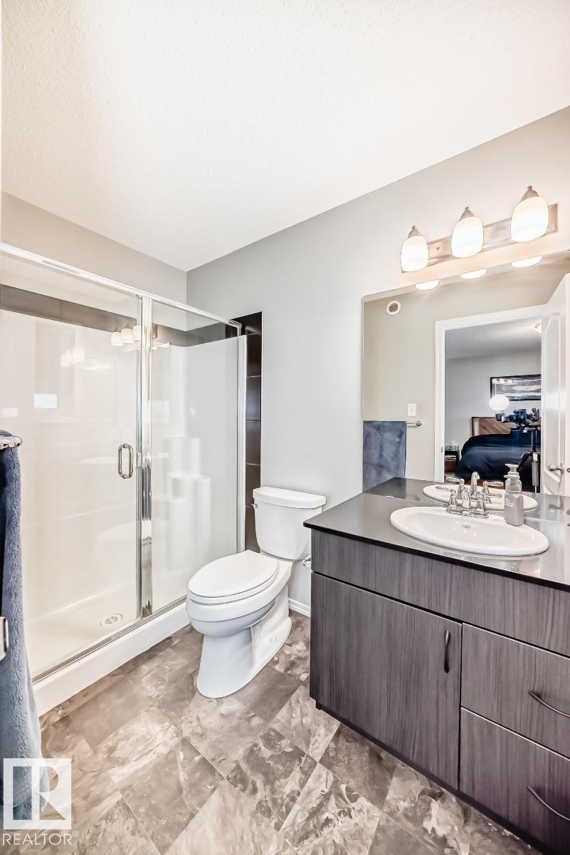 Ensuite bathroom with vanity and a shower stall - 2823 Duke Crescent, Edmonton, AB - Indoor Photo Showing Bathroom