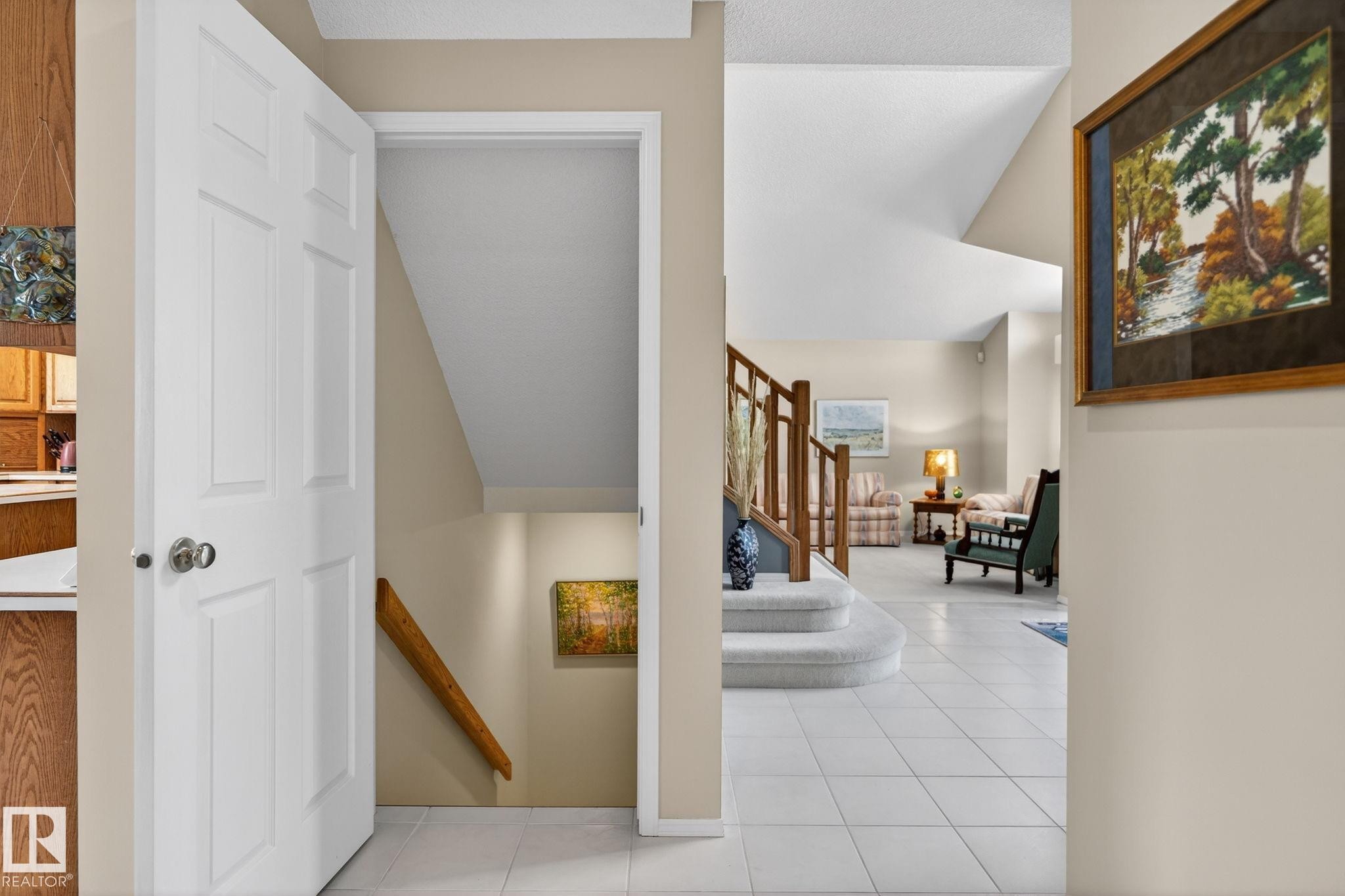 Staircase featuring tile patterned flooring - 313 Hedley Way, Edmonton, AB - Indoor Photo Showing Other Room