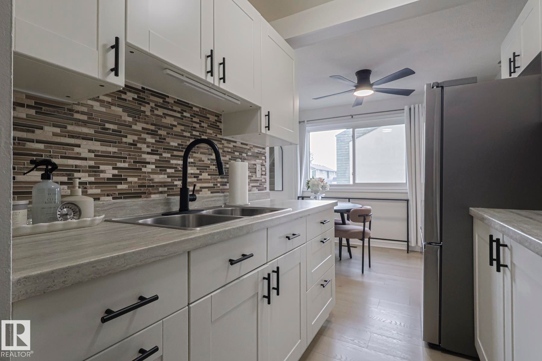 663 Abbottsfield Road, Edmonton, AB - Indoor Photo Showing Kitchen With Double Sink