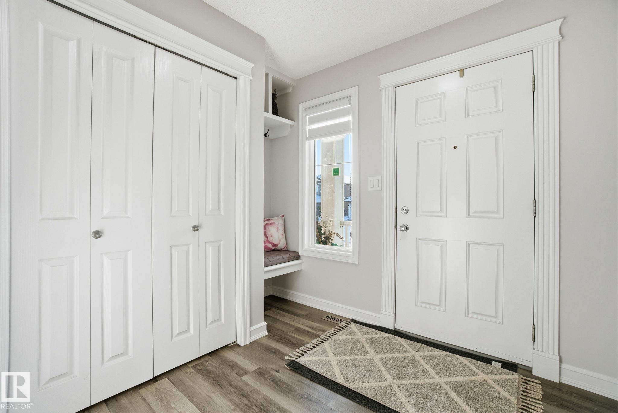 Entryway with wood finished floors - 1532 37C Avenue, Edmonton, AB - Indoor