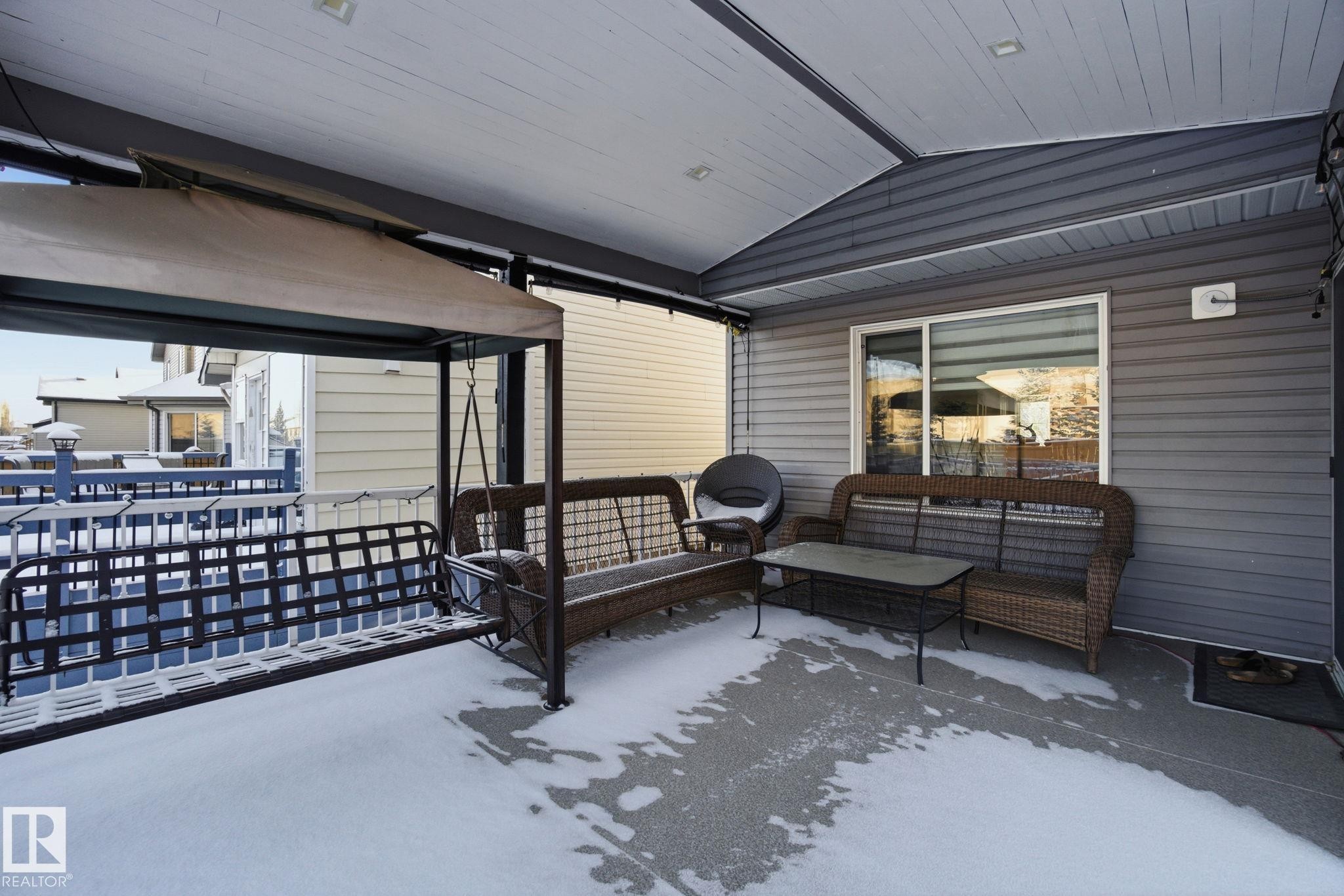 View of patio with an outdoor hangout area - 1532 37C Avenue, Edmonton, AB - Outdoor With Deck Patio Veranda With Exterior