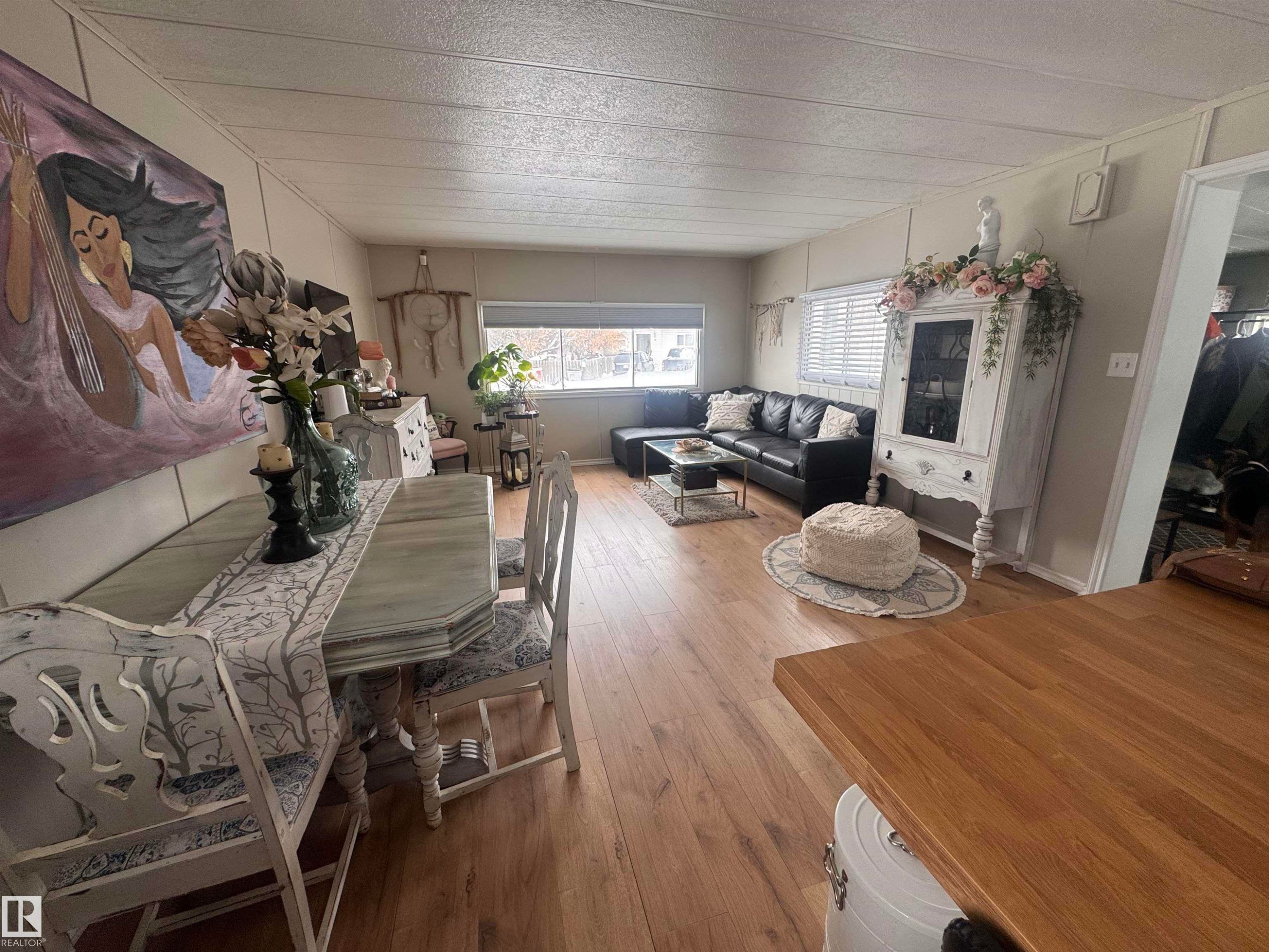 Living room featuring hardwood / wood-style floors - #44 9501 104 Ave, Westlock, AB - Indoor