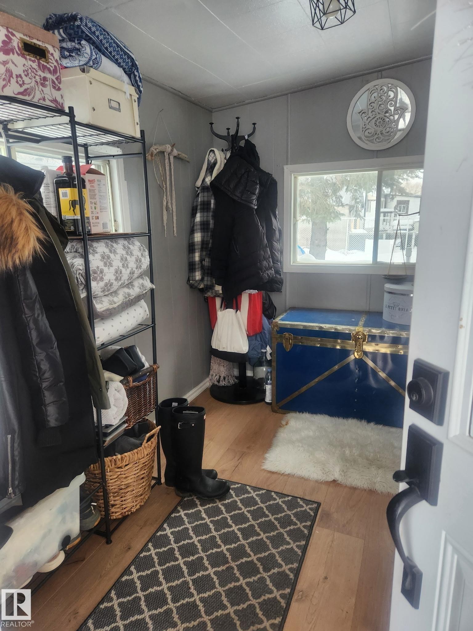 Mudroom with wood-type flooring - #44 9501 104 Ave, Westlock, AB - Indoor