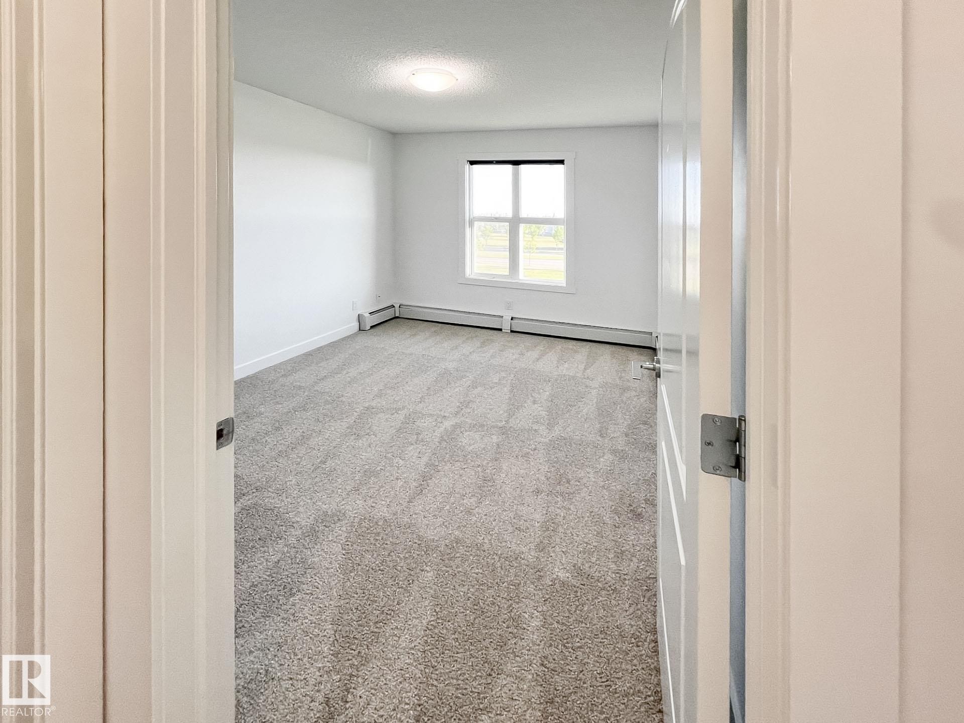 406 667 Watt Boulevard, Edmonton, AB - Indoor Photo Showing Other Room