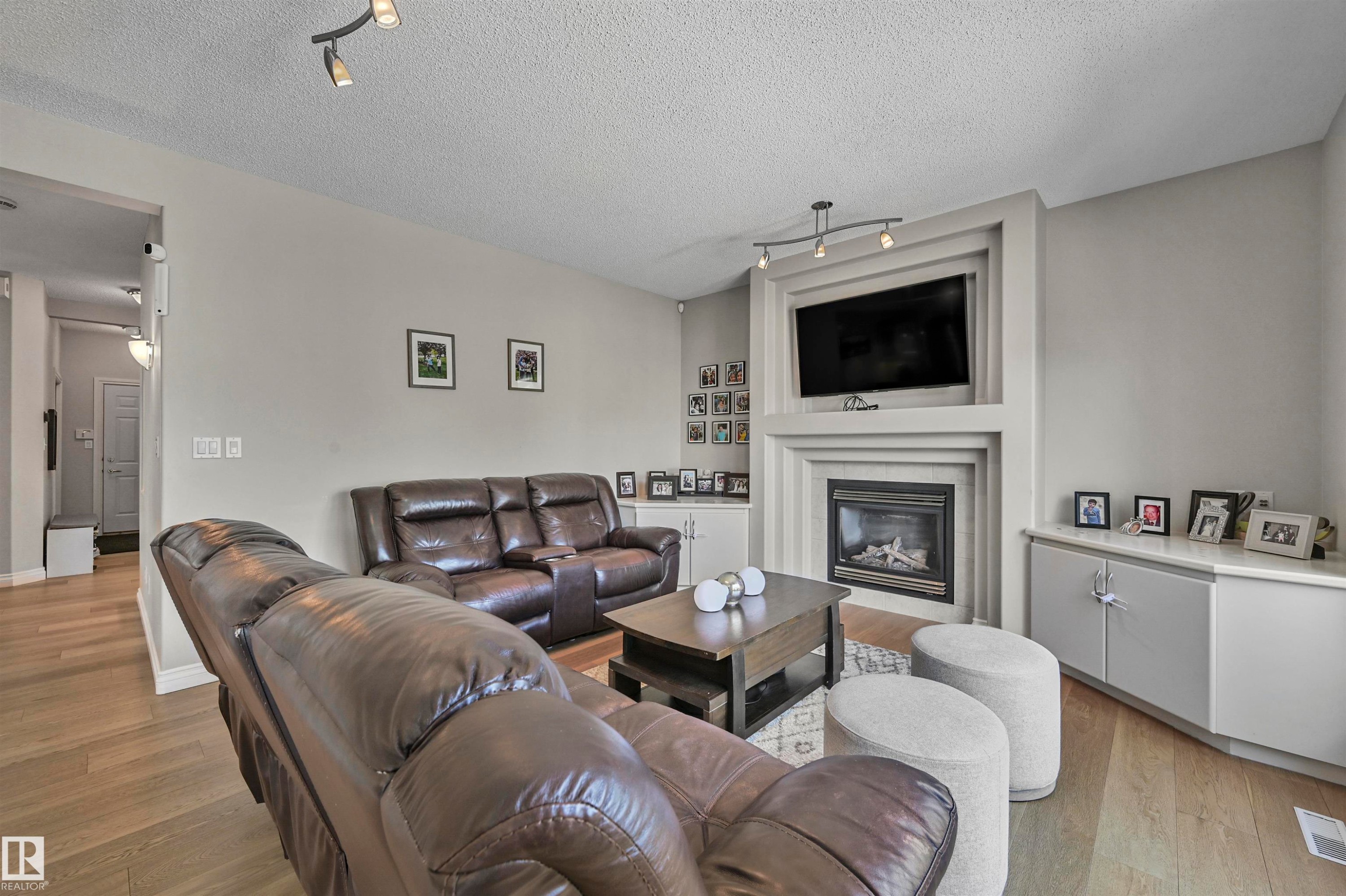 1516 Thorogood Close, Edmonton, AB - Indoor Photo Showing Living Room With Fireplace