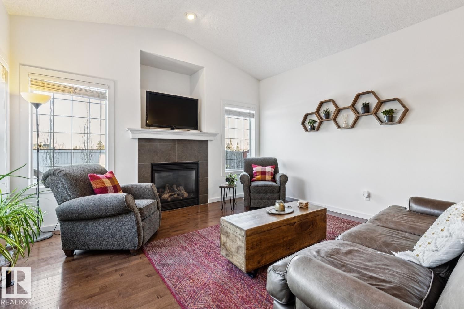 3127 Trelle Loop, Edmonton, AB - Indoor Photo Showing Living Room With Fireplace