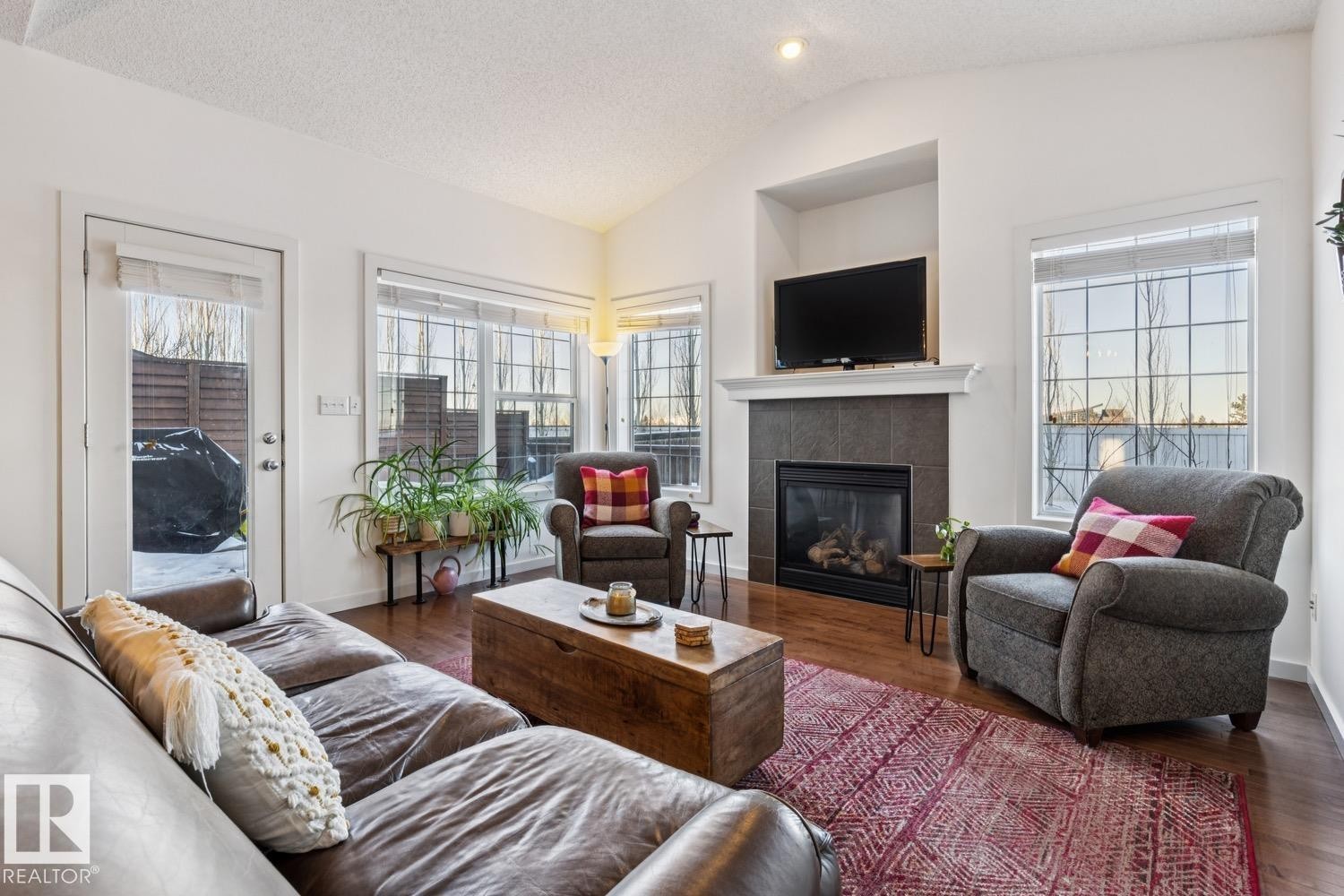 3127 Trelle Loop, Edmonton, AB - Indoor Photo Showing Living Room With Fireplace
