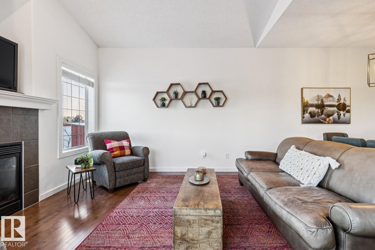 3127 Trelle Loop, Edmonton, AB - Indoor Photo Showing Living Room With Fireplace