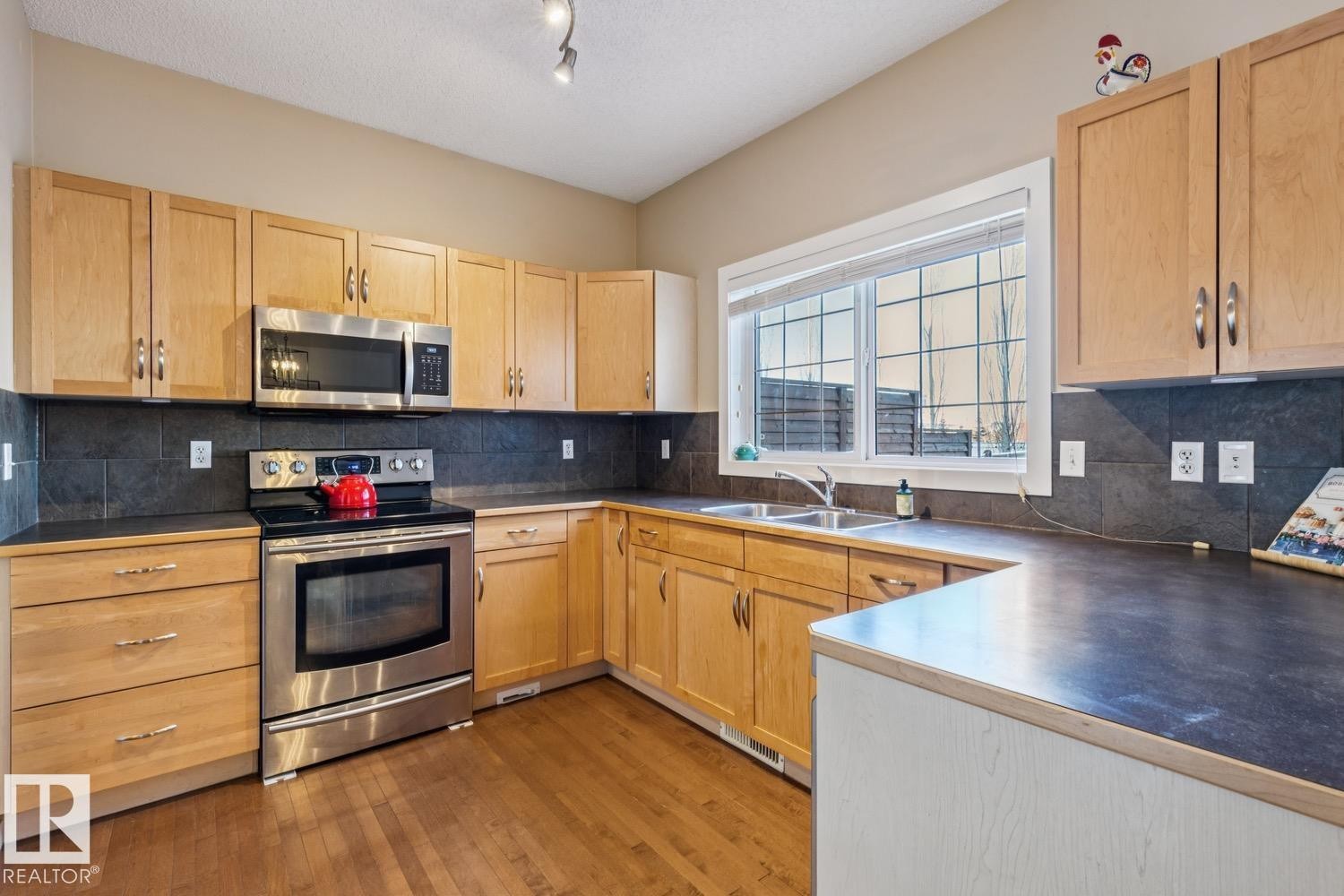 3127 Trelle Loop, Edmonton, AB - Indoor Photo Showing Kitchen With Double Sink