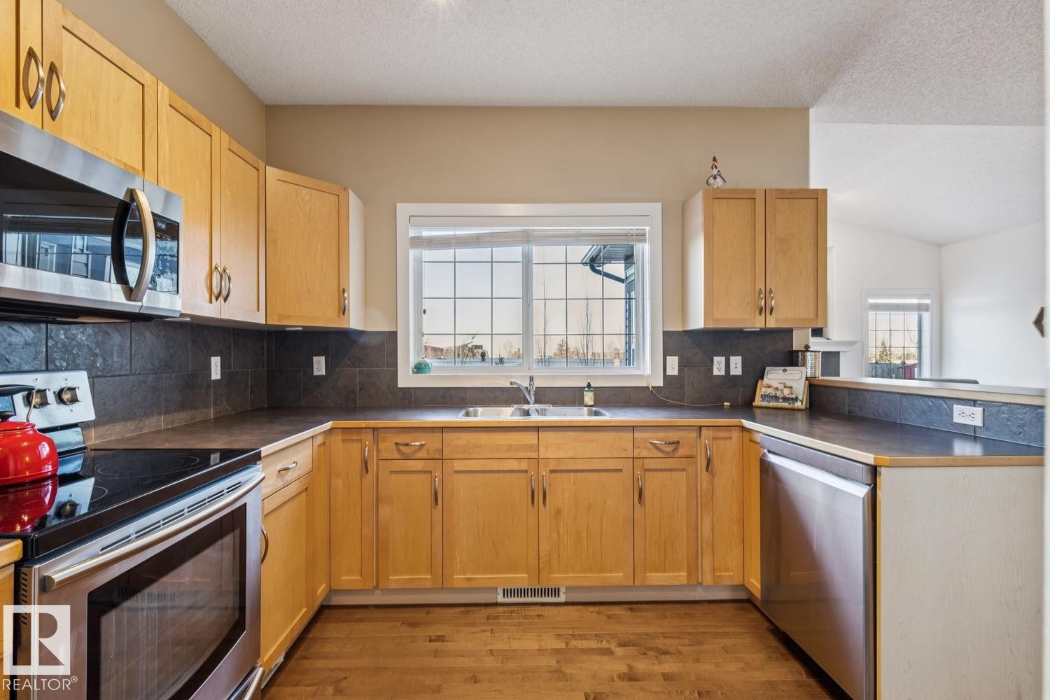 3127 Trelle Loop, Edmonton, AB - Indoor Photo Showing Kitchen With Double Sink