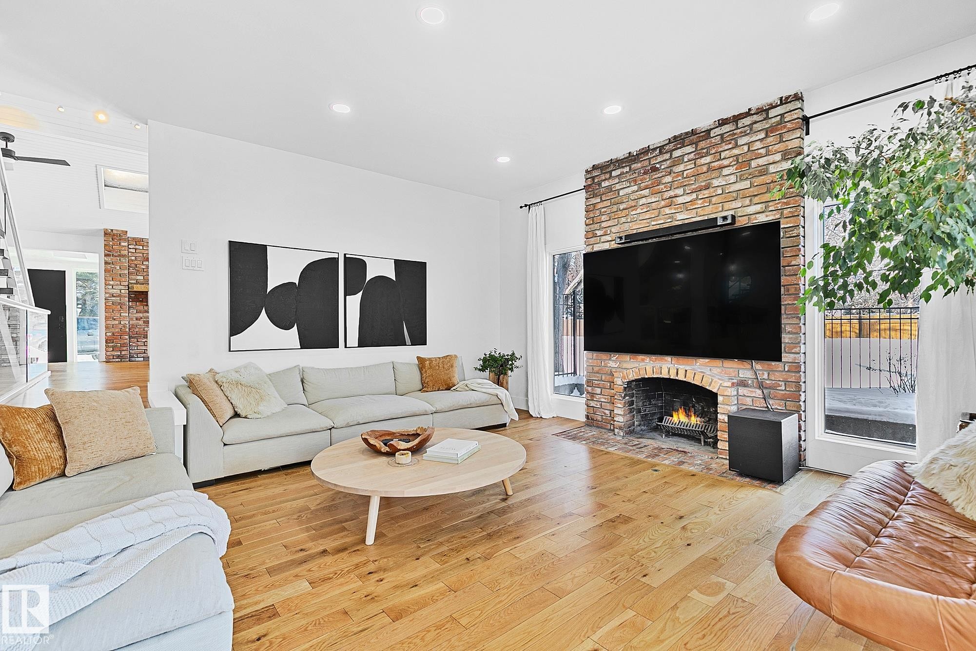 100 Wolf Willow Crescent, Edmonton, AB - Indoor Photo Showing Living Room With Fireplace
