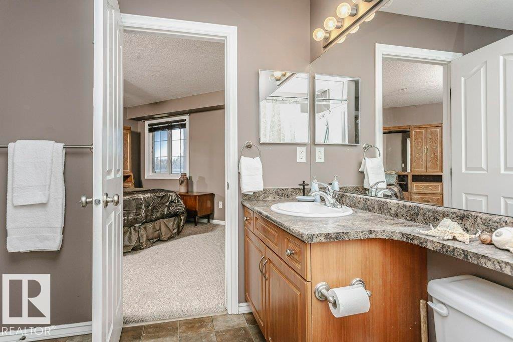 325 7801 Golf Course Road, Stony Plain, AB - Indoor Photo Showing Bathroom