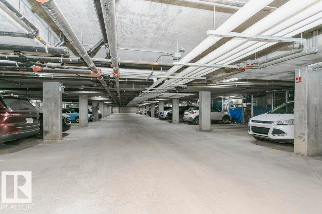 325 7801 Golf Course Road, Stony Plain, AB - Indoor Photo Showing Garage