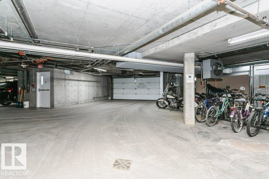 325 7801 Golf Course Road, Stony Plain, AB - Indoor Photo Showing Garage