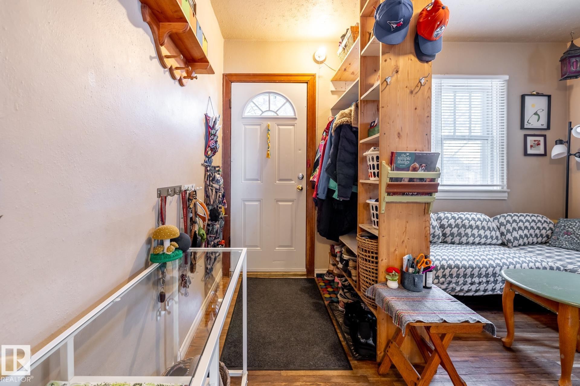 Foyer with dark wood-style flooring - 11240 84 Street, Edmonton, AB - Indoor