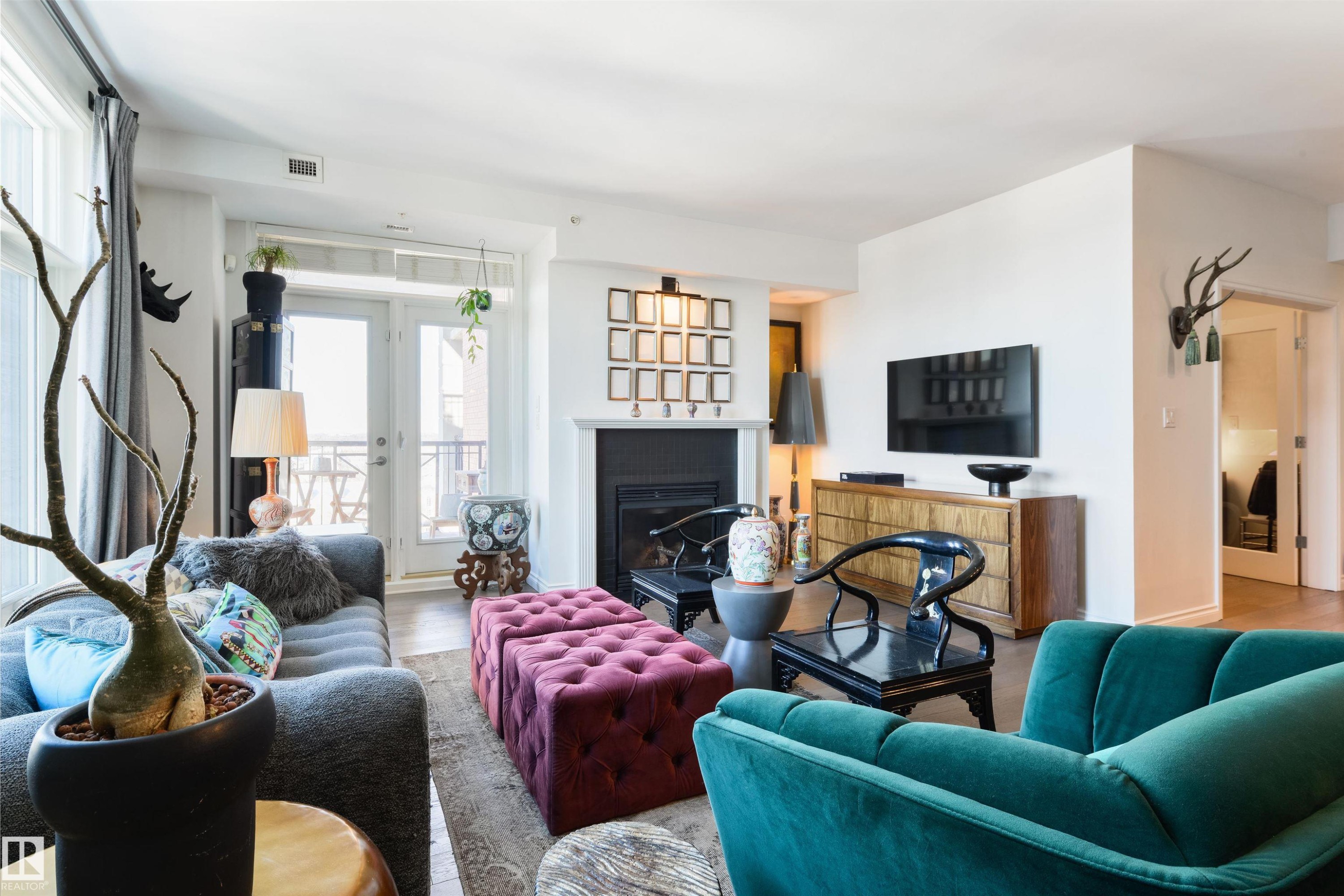 1107 9020 Jasper Avenue, Edmonton, AB - Indoor Photo Showing Living Room With Fireplace