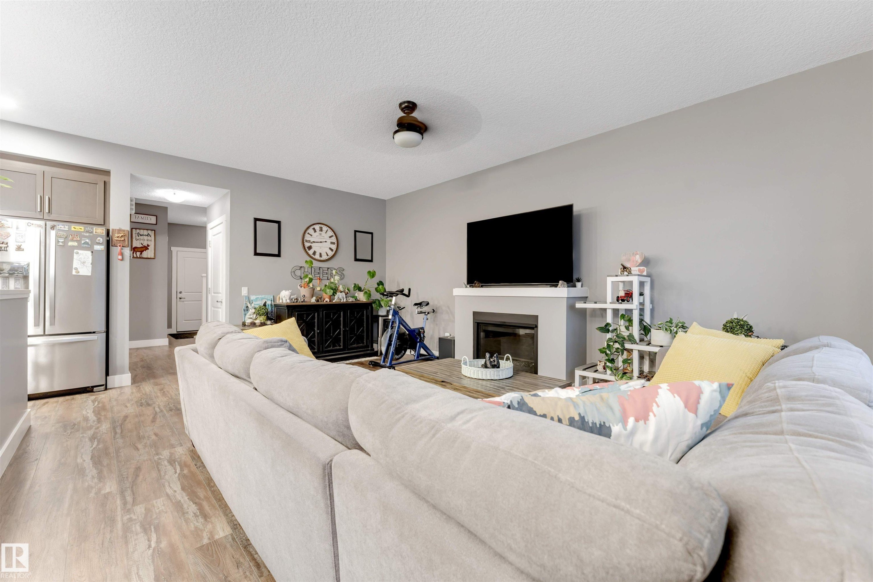 2987 Chokecherry Common, Edmonton, AB - Indoor Photo Showing Living Room With Fireplace
