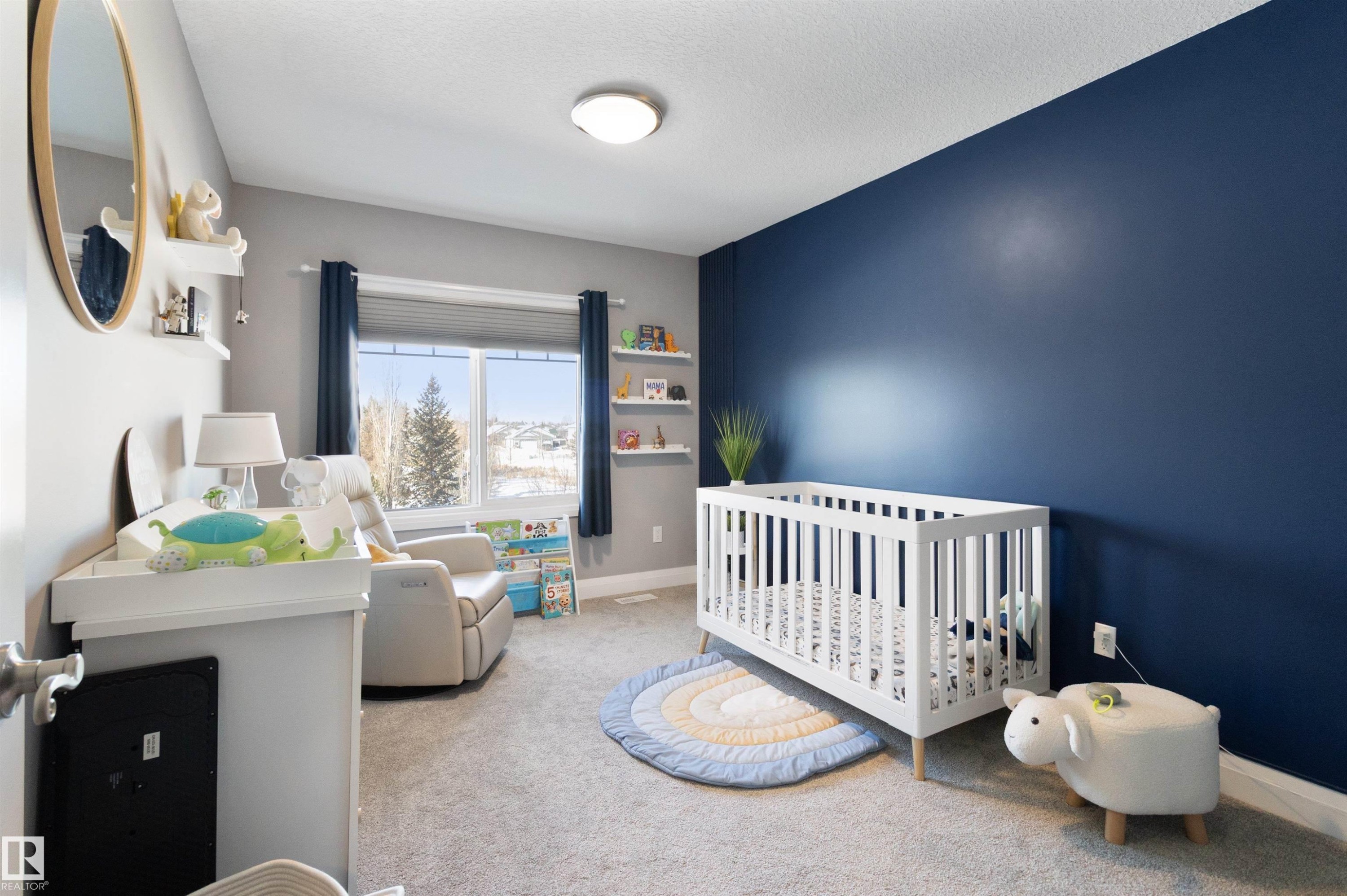 Bedroom featuring a nursery area and light carpet - 56 Durrand Bend, Fort Saskatchewan, AB - Indoor Photo Showing Bedroom