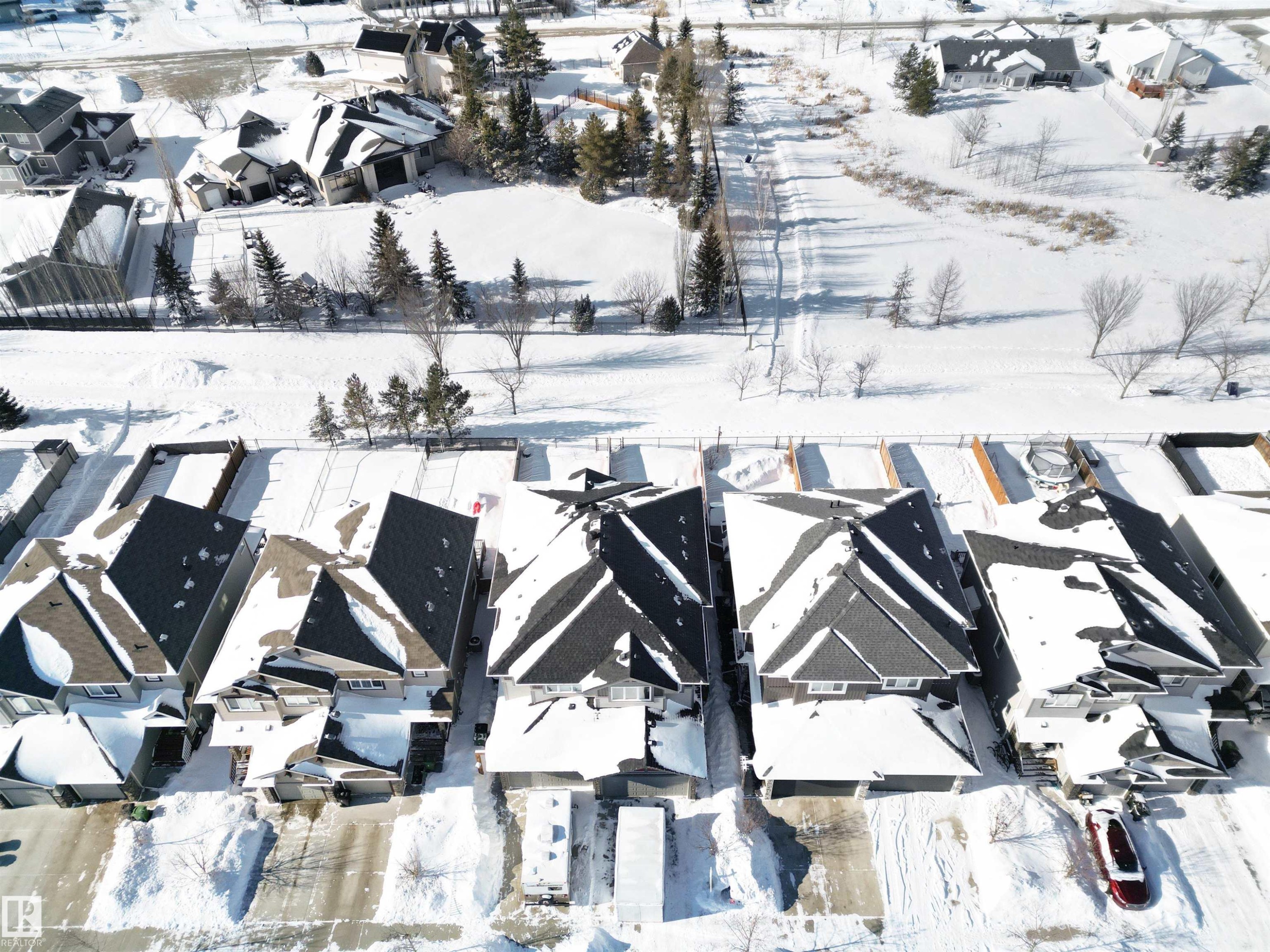 Snowy aerial view with a residential view - 56 Durrand Bend, Fort Saskatchewan, AB - Outdoor With View