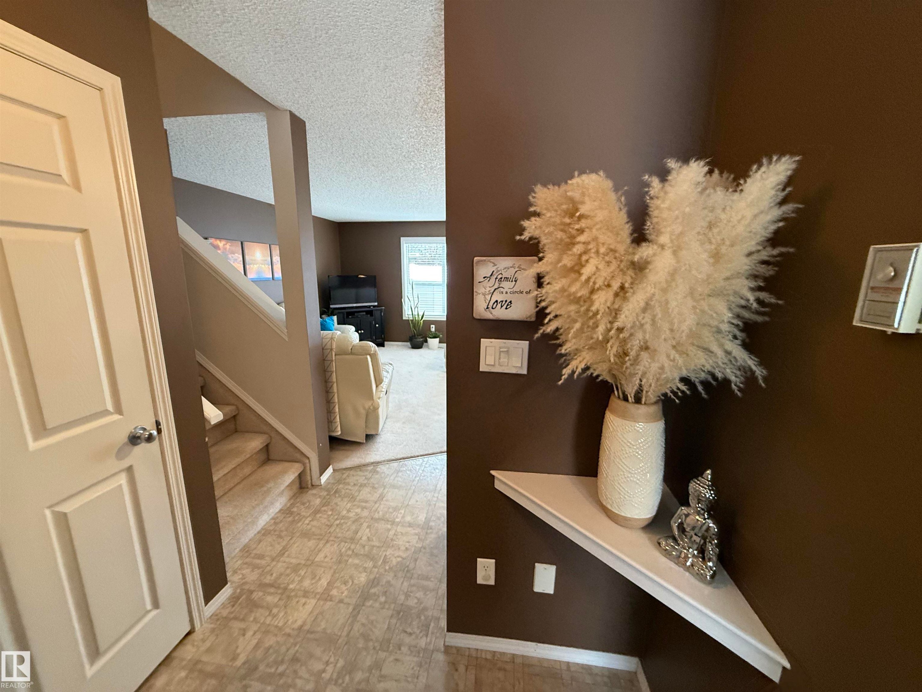 Corridor with a textured ceiling and light floors - 19 2021 Grantham Crest, Edmonton, AB - Indoor Photo Showing Other Room
