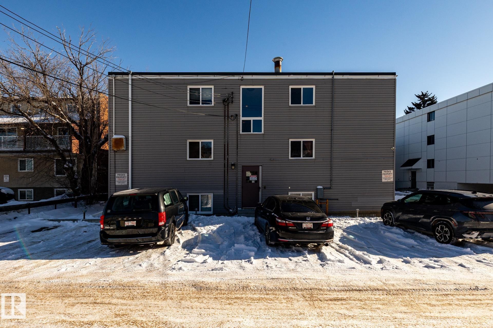 View of snow covered house - 15 10620 122 Street, Edmonton, AB - Outdoor