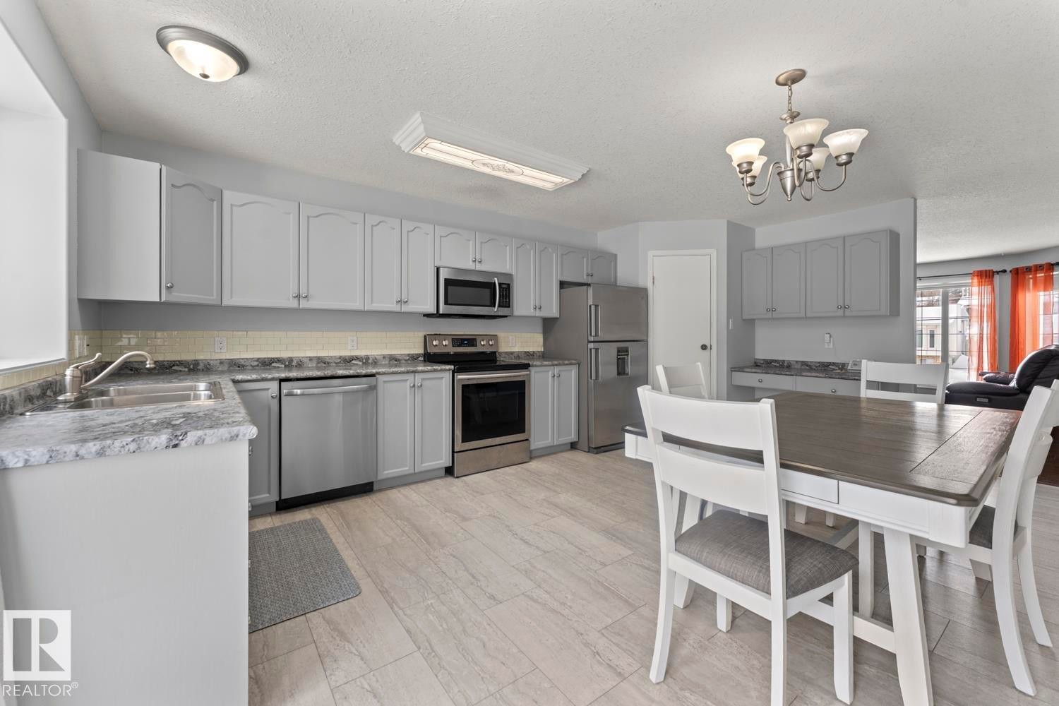 1006 11 Street, Cold Lake, AB - Indoor Photo Showing Kitchen With Double Sink