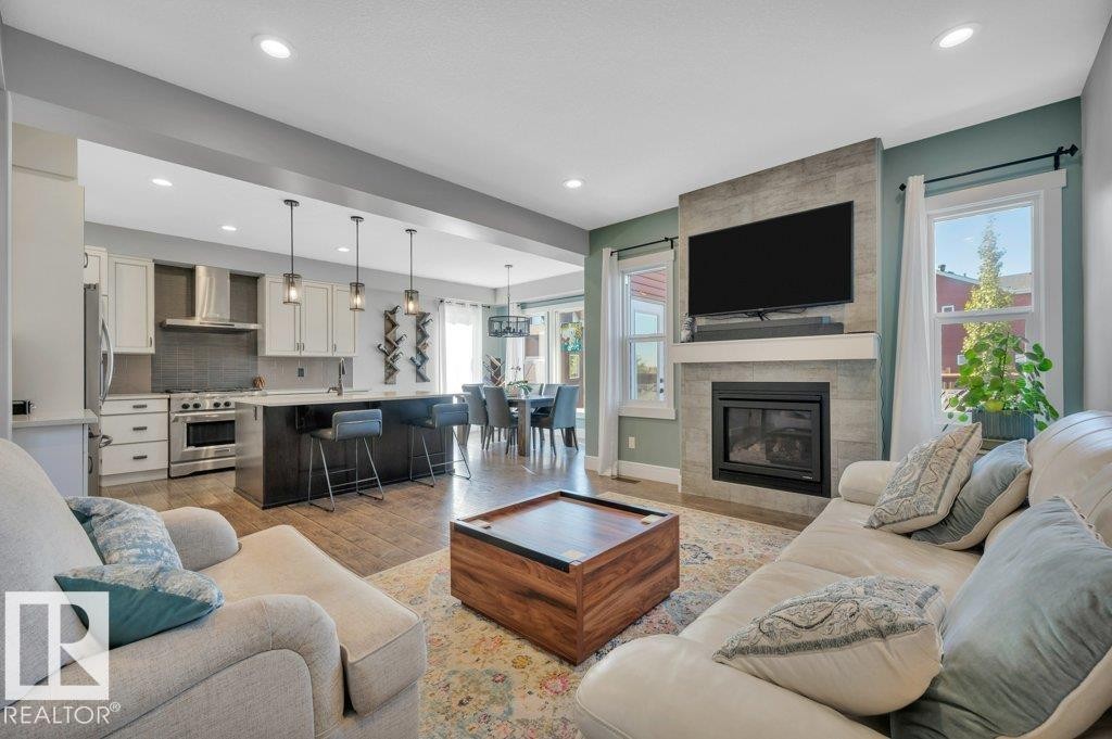 6123 19 Avenue, Edmonton, AB - Indoor Photo Showing Living Room With Fireplace