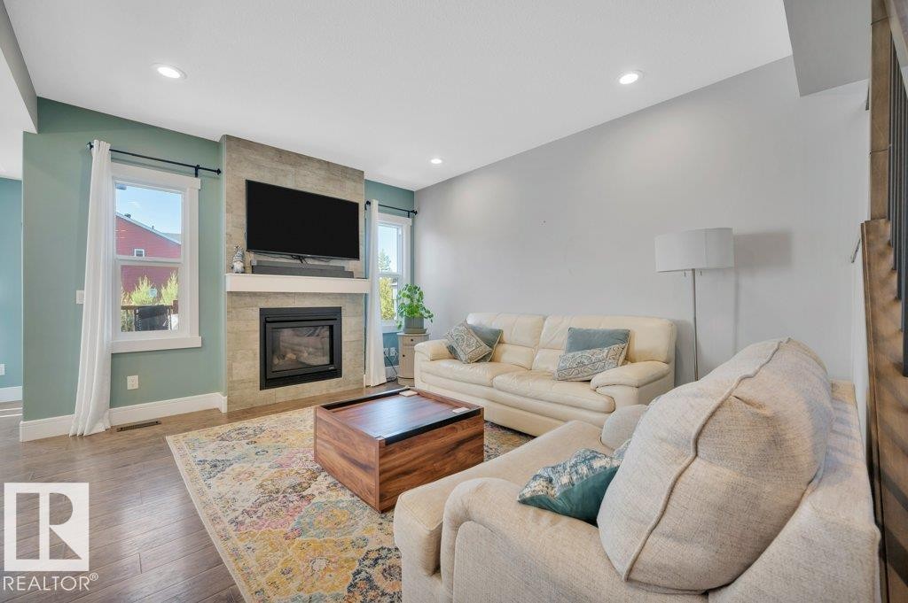 6123 19 Avenue, Edmonton, AB - Indoor Photo Showing Living Room With Fireplace