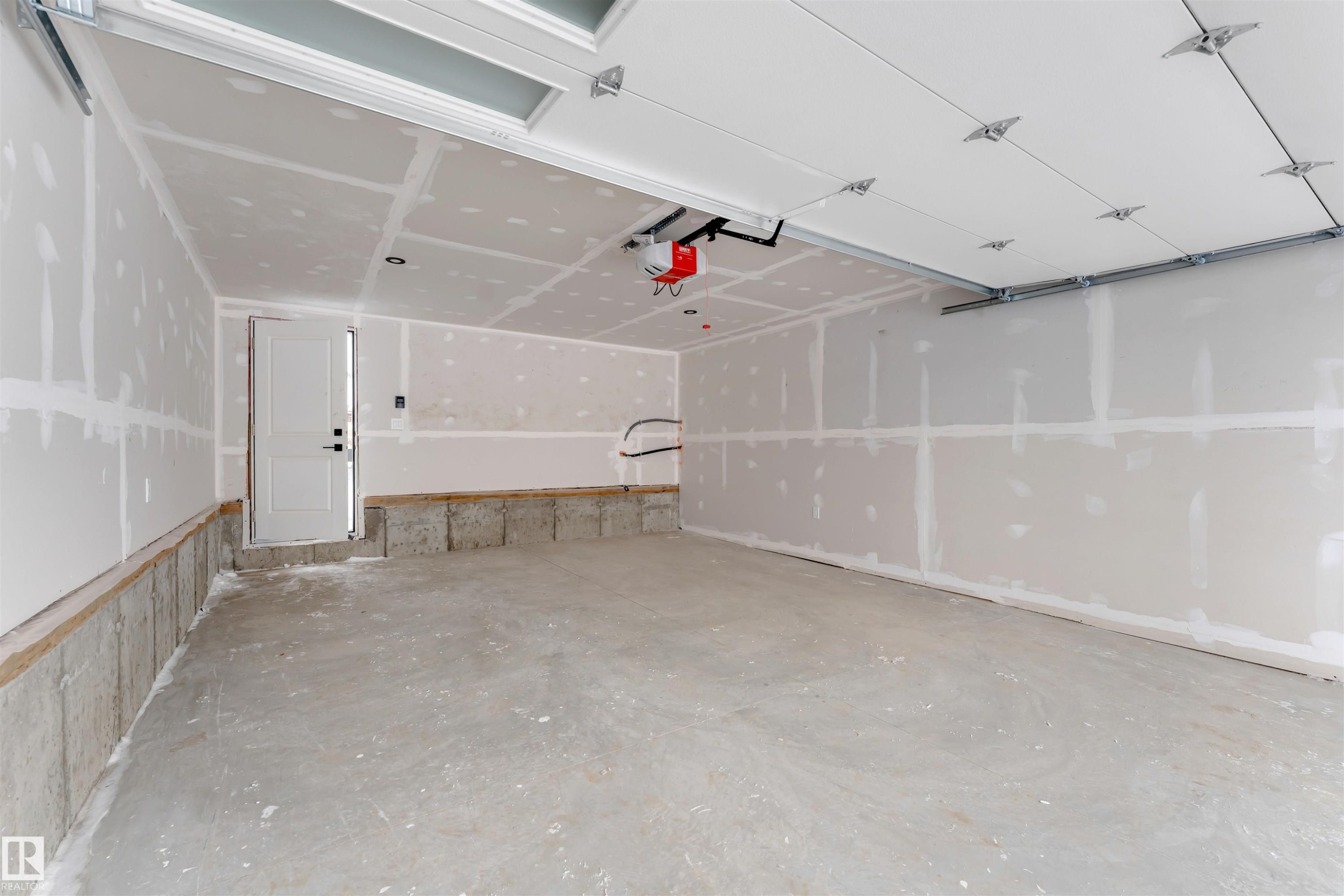 4371 37 Street, Beaumont, AB - Indoor Photo Showing Garage