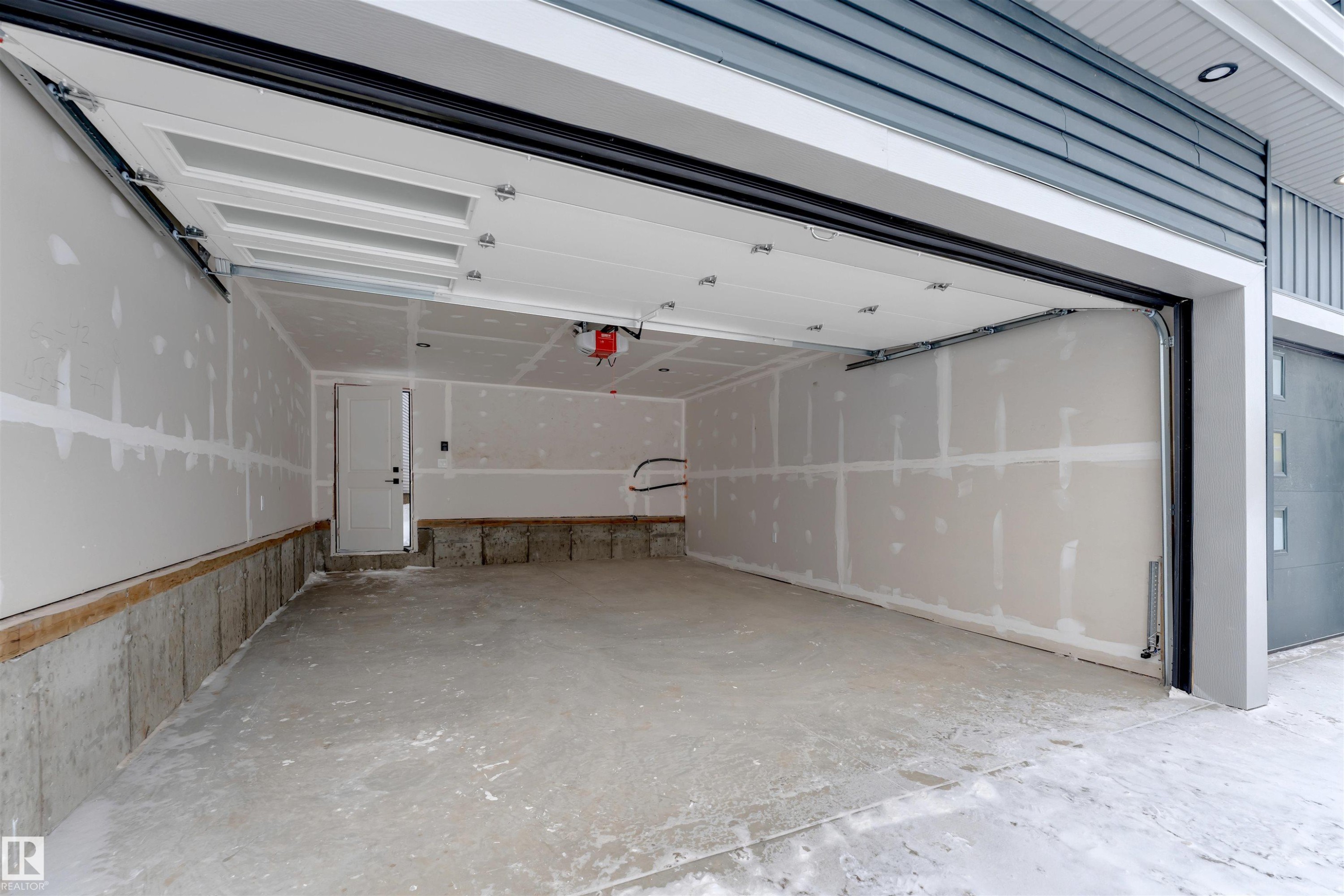 4371 37 Street, Beaumont, AB - Indoor Photo Showing Garage