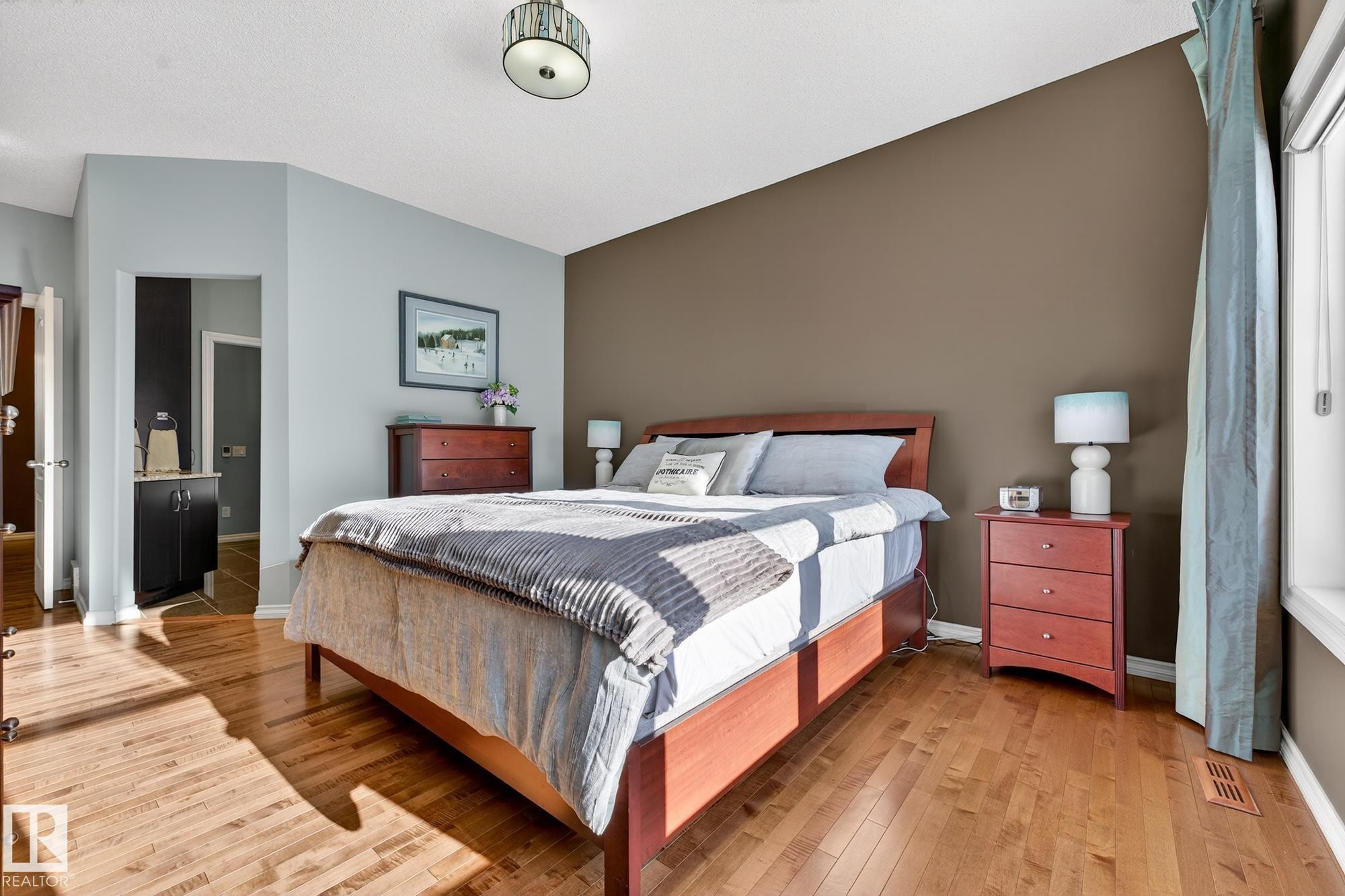 Bedroom featuring light wood-style floors and baseboards - 2036 Hilliard Place, Edmonton, AB - Indoor Photo Showing Bedroom