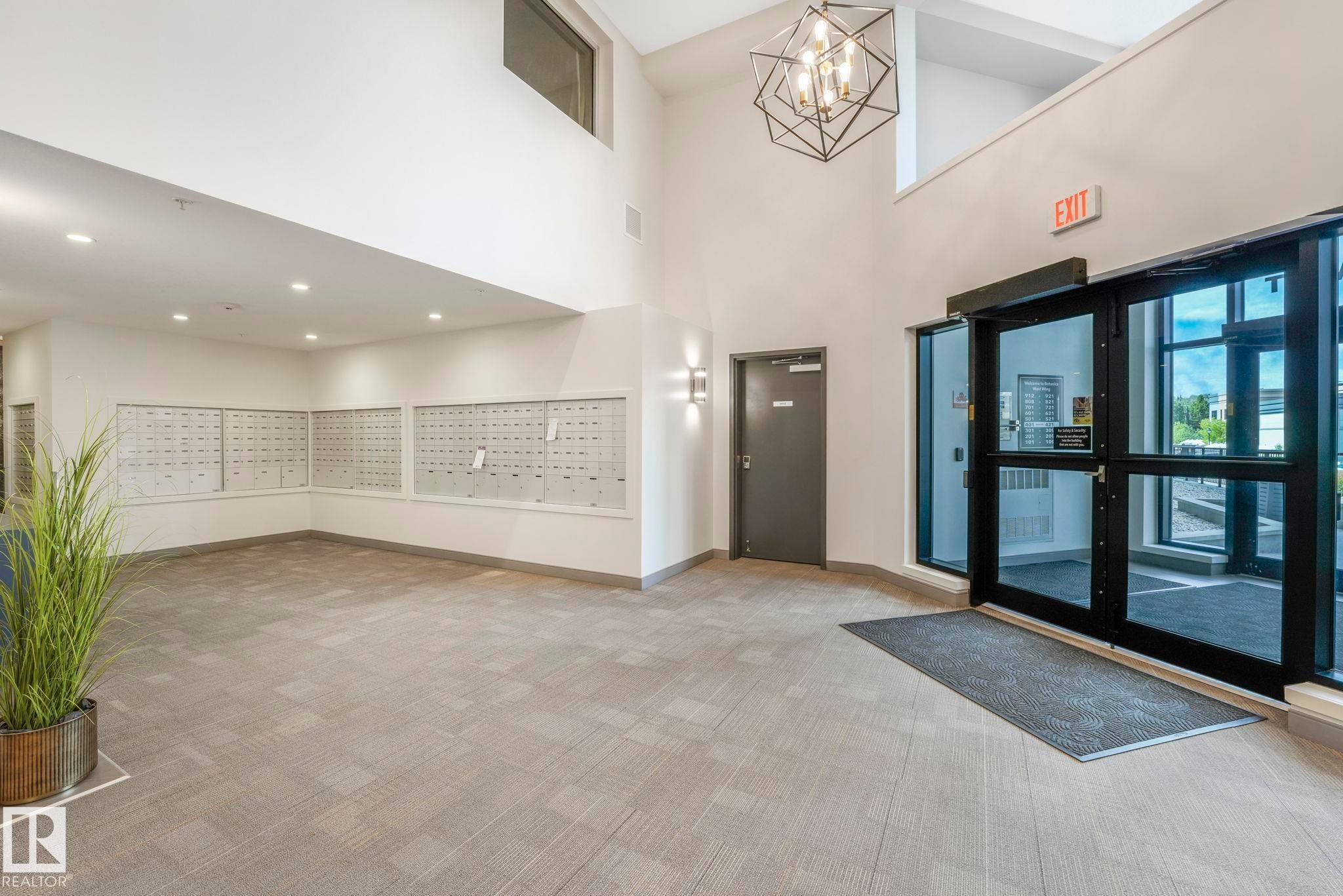 Mailbox's are located here. - 814 200 Bellerose Drive, St. Albert, AB - Indoor Photo Showing Other Room