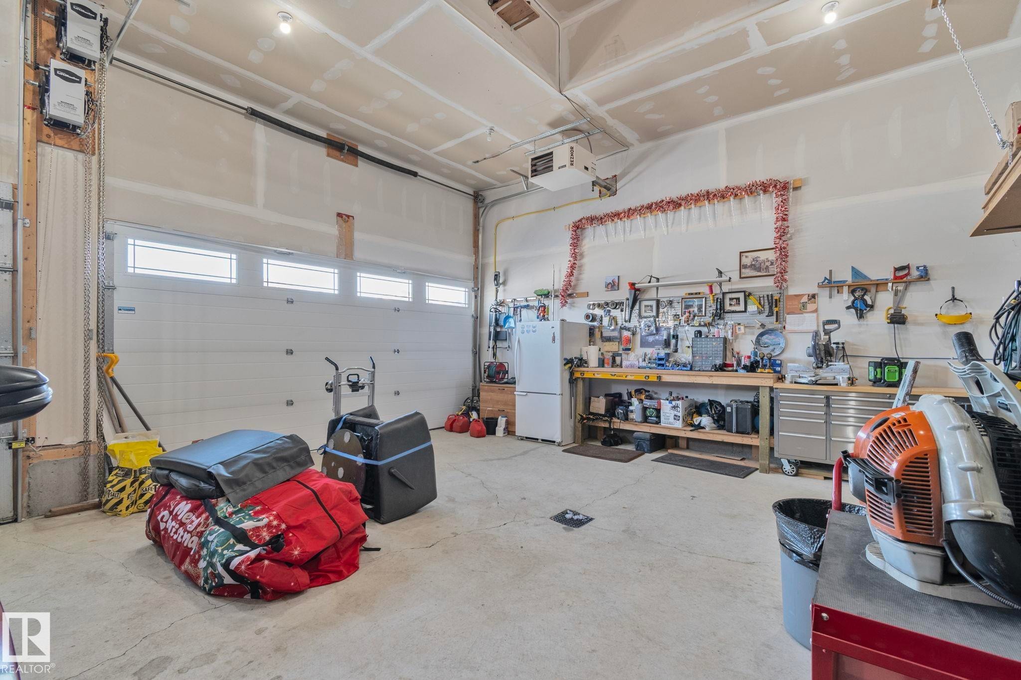 105 Houle Drive, Morinville, AB - Indoor Photo Showing Garage