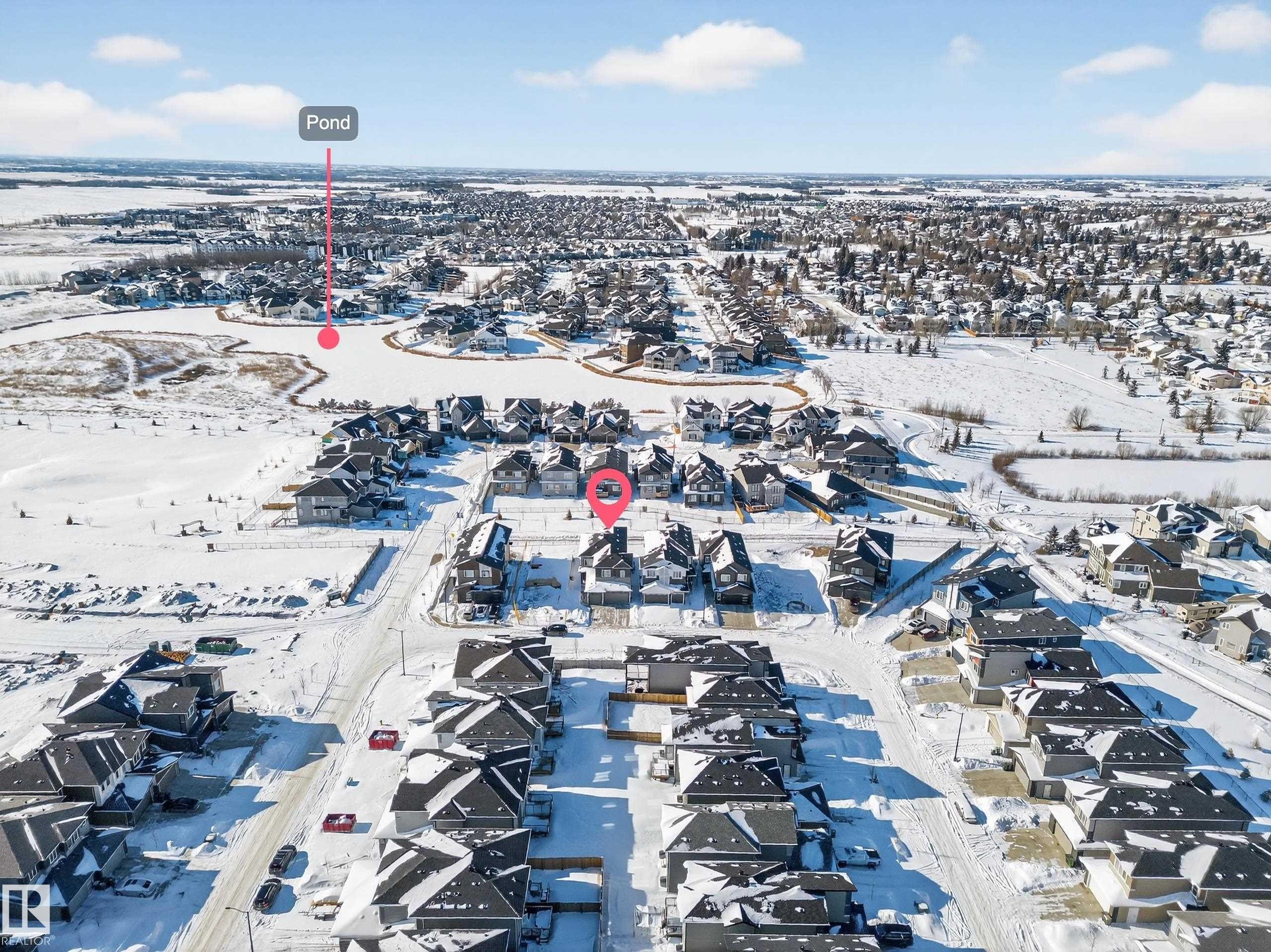 View of snowy aerial view - 4006 40 Street, Beaumont, AB - Outdoor With View