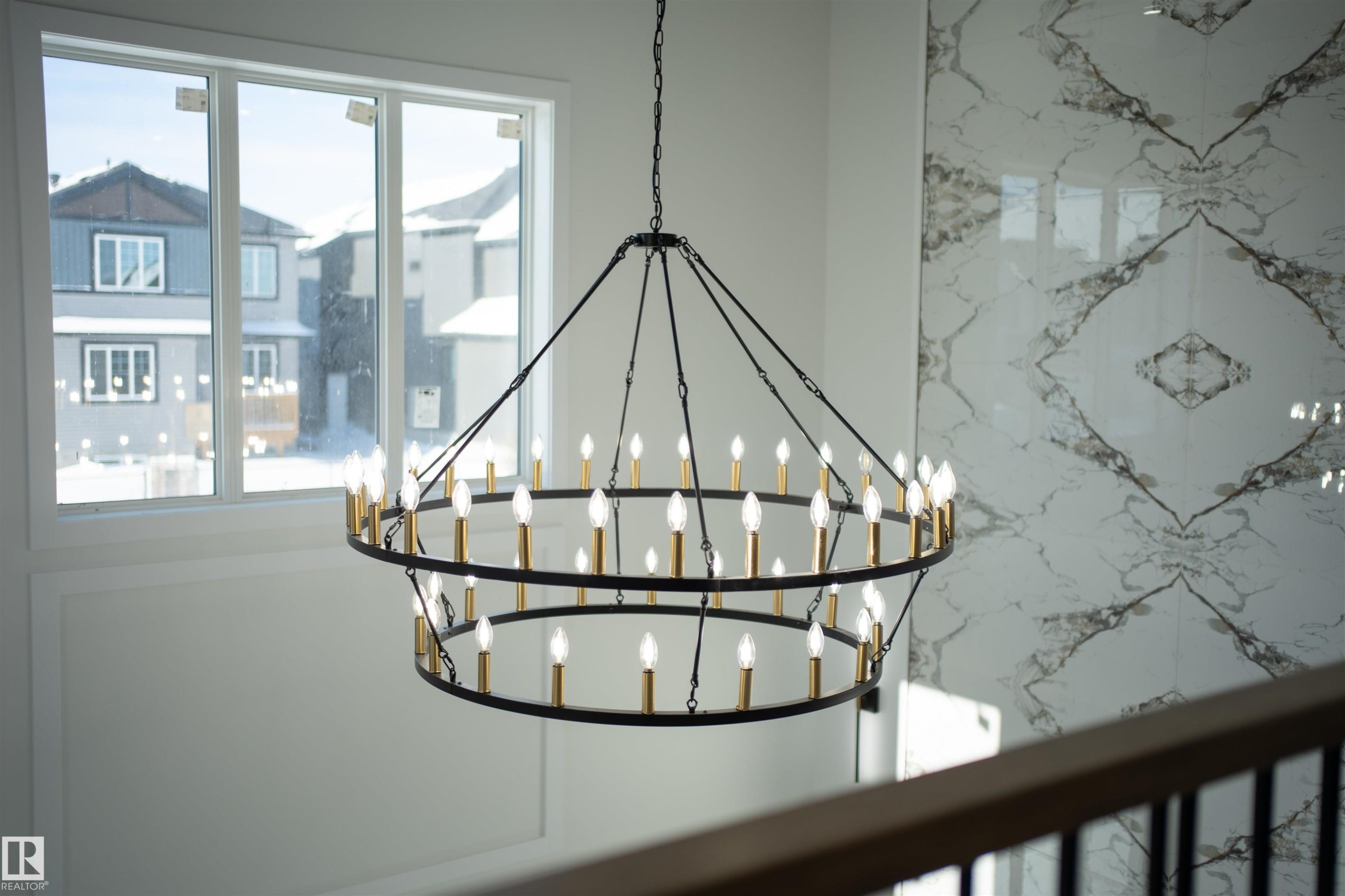 Detailed view of suspended lighting - 4006 40 Street, Beaumont, AB - Indoor Photo Showing Other Room