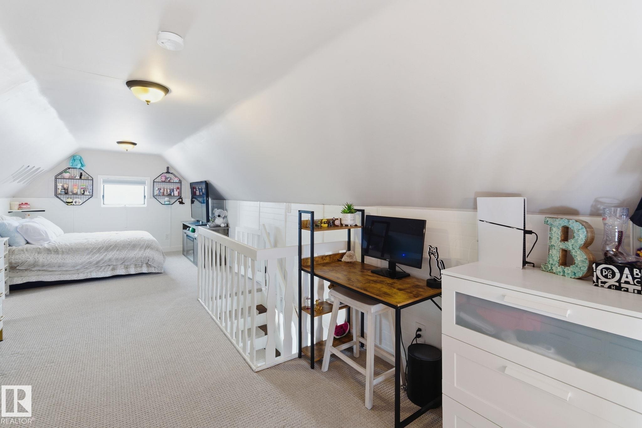 Bedroom featuring light carpet - 4919 50 Avenue, Bon Accord, AB - Indoor Photo Showing Bedroom