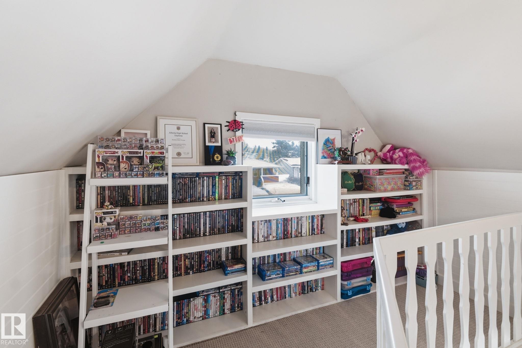 Walk in closet featuring carpet floors - 4919 50 Avenue, Bon Accord, AB - Indoor