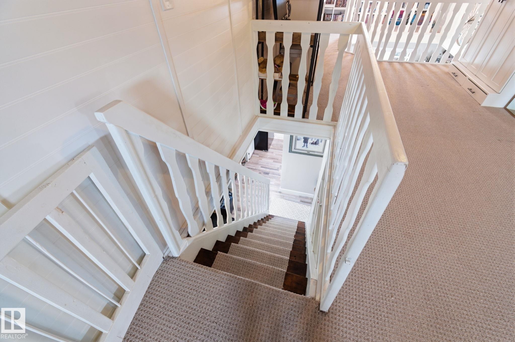 Stairs with carpet - 4919 50 Avenue, Bon Accord, AB - Indoor Photo Showing Other Room