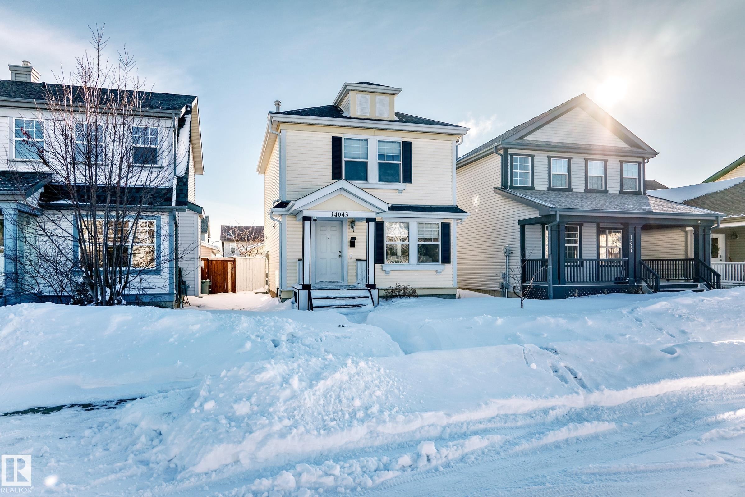 View of front of house with covered porch - 14043 151 Avenue, Edmonton, AB - Outdoor With Facade