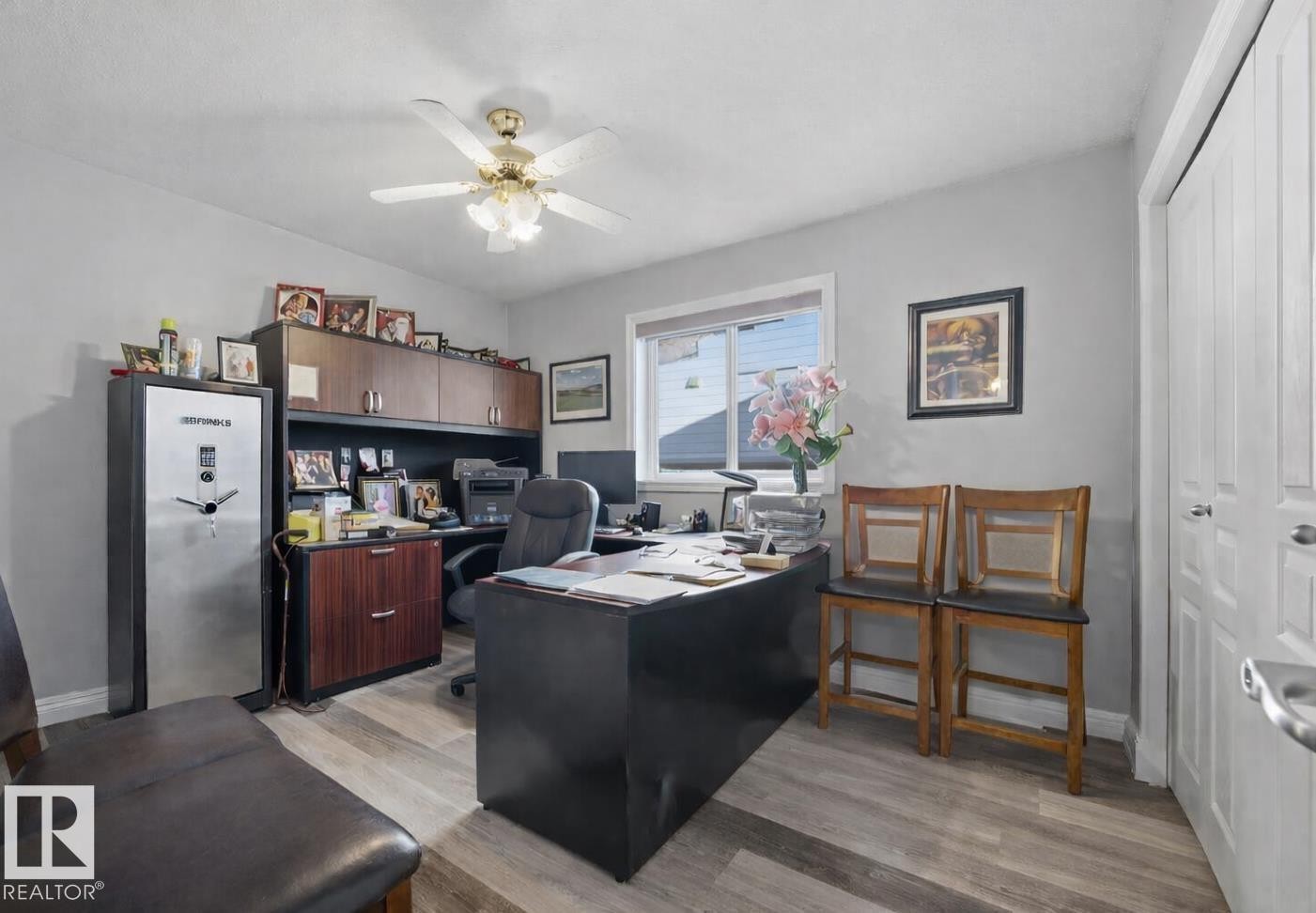 Home office featuring light wood-style floors and a ceiling fan - 3011 44A Street, Edmonton, AB - Indoor Photo Showing Office